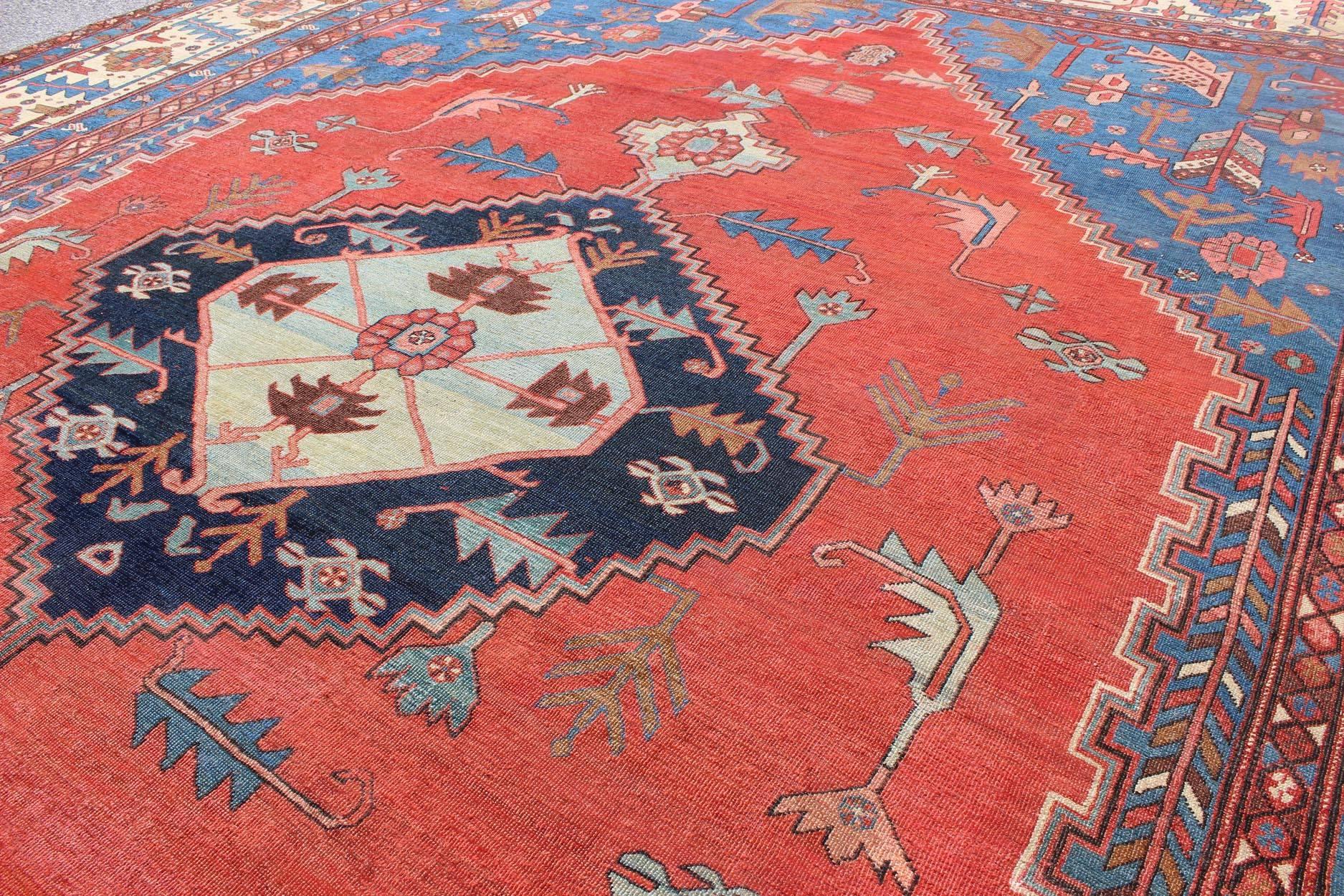 19th Century Antique Persian Large Bakshaish Serapi Rug in Brick Red, Royal Blue and Ivory For Sale