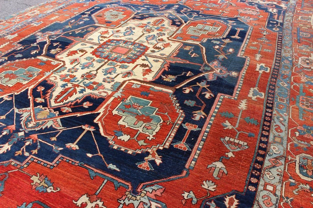 20th Century Large Antique Persian Fine Weave Serapi Rug with Bold Geometric Medallion For Sale