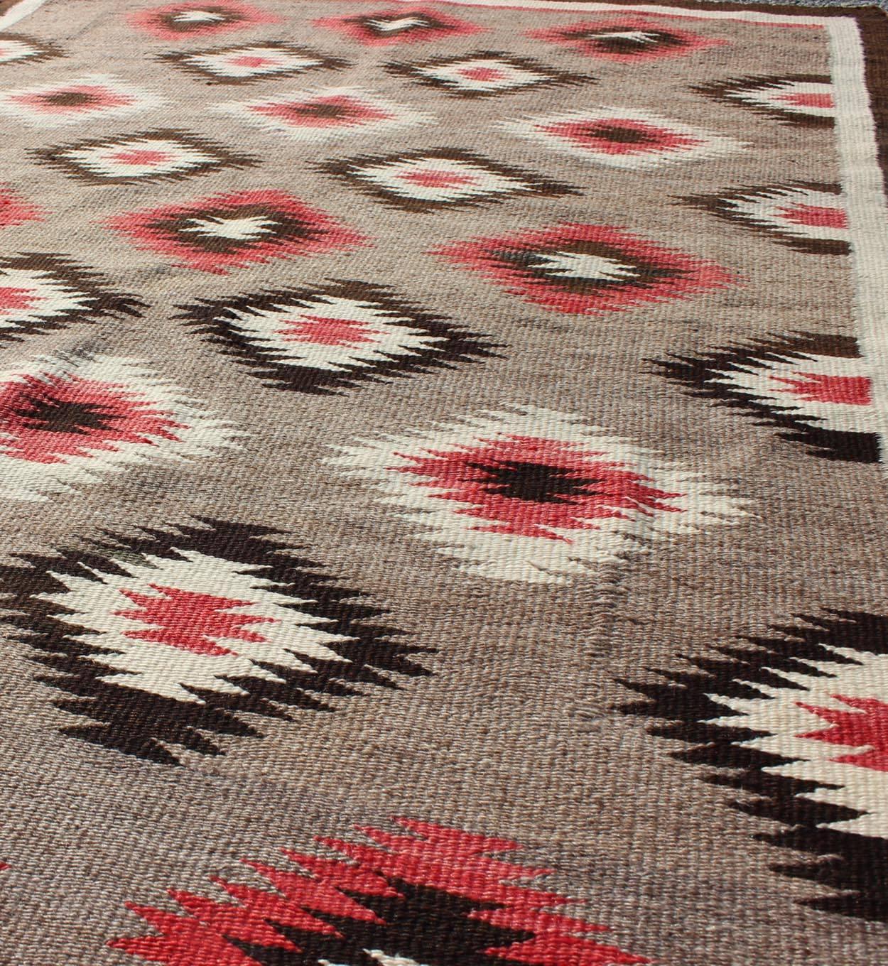 American Navajo Rug with Geometric All-Over Design in Reds and Browns In Excellent Condition For Sale In Atlanta, GA