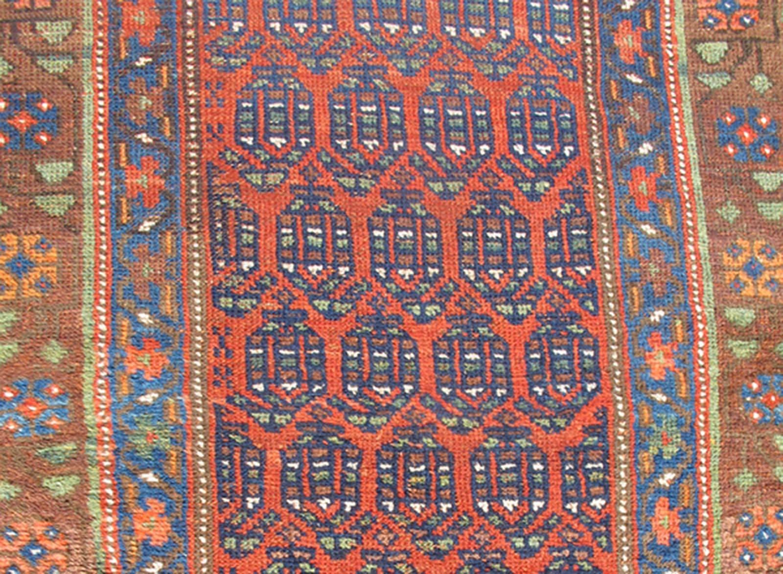 Tribal Long Persian Bidjar Kurdish Runner with small Paisley Design in Red, Blue, Brown For Sale