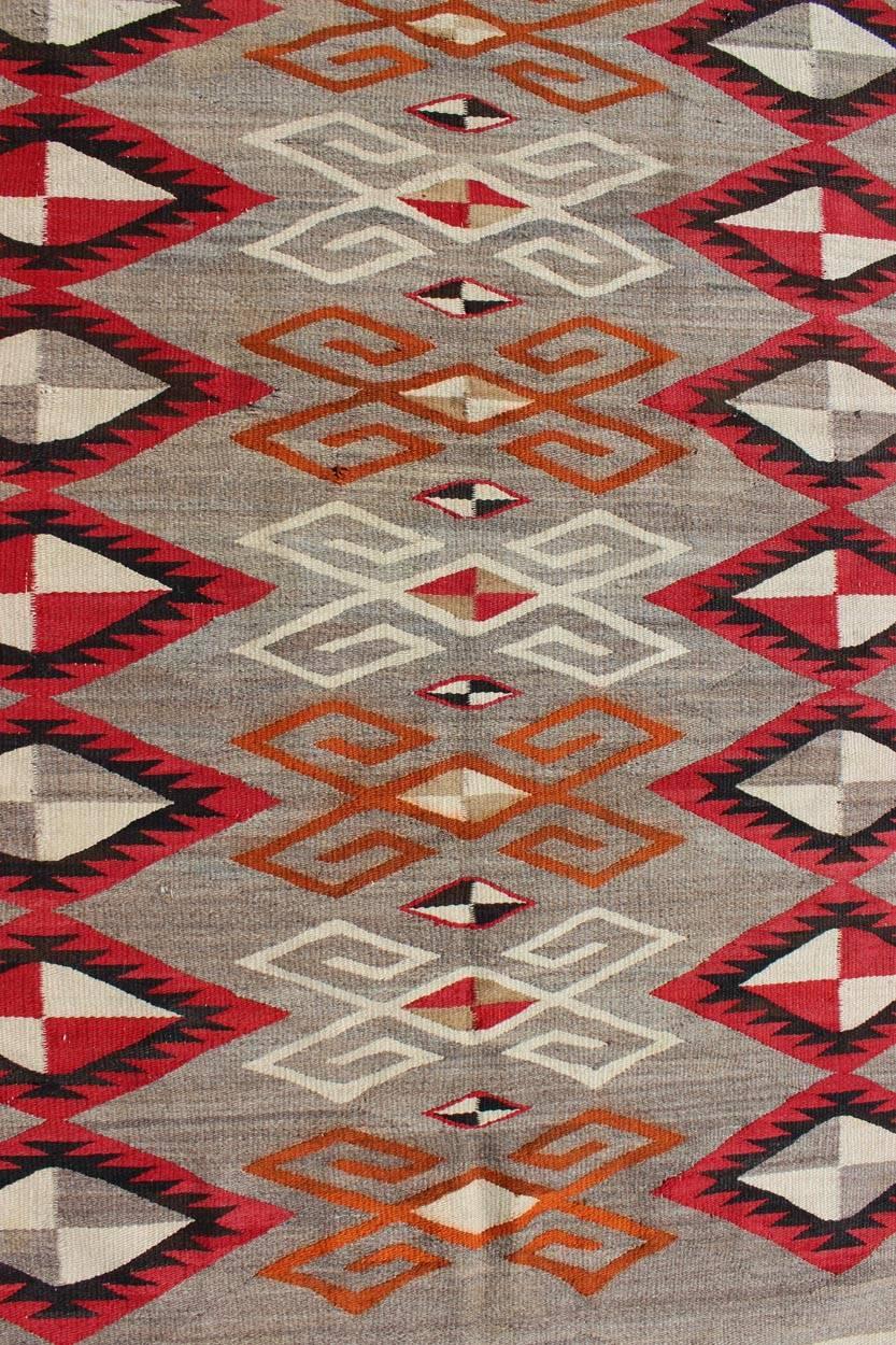 American Antique Navajo Rug with Semi-Symmetrical All-Over Diamond Design  For Sale
