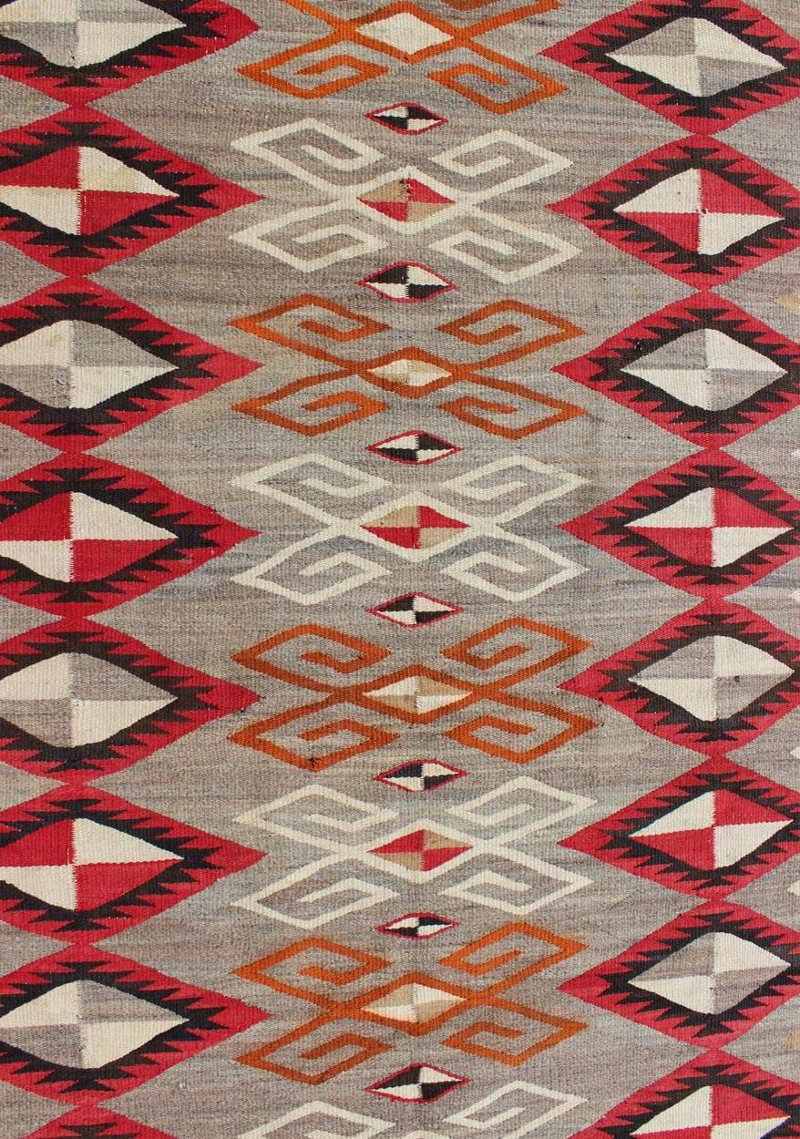 Hand-Woven Antique Navajo Rug with Semi-Symmetrical All-Over Diamond Design  For Sale