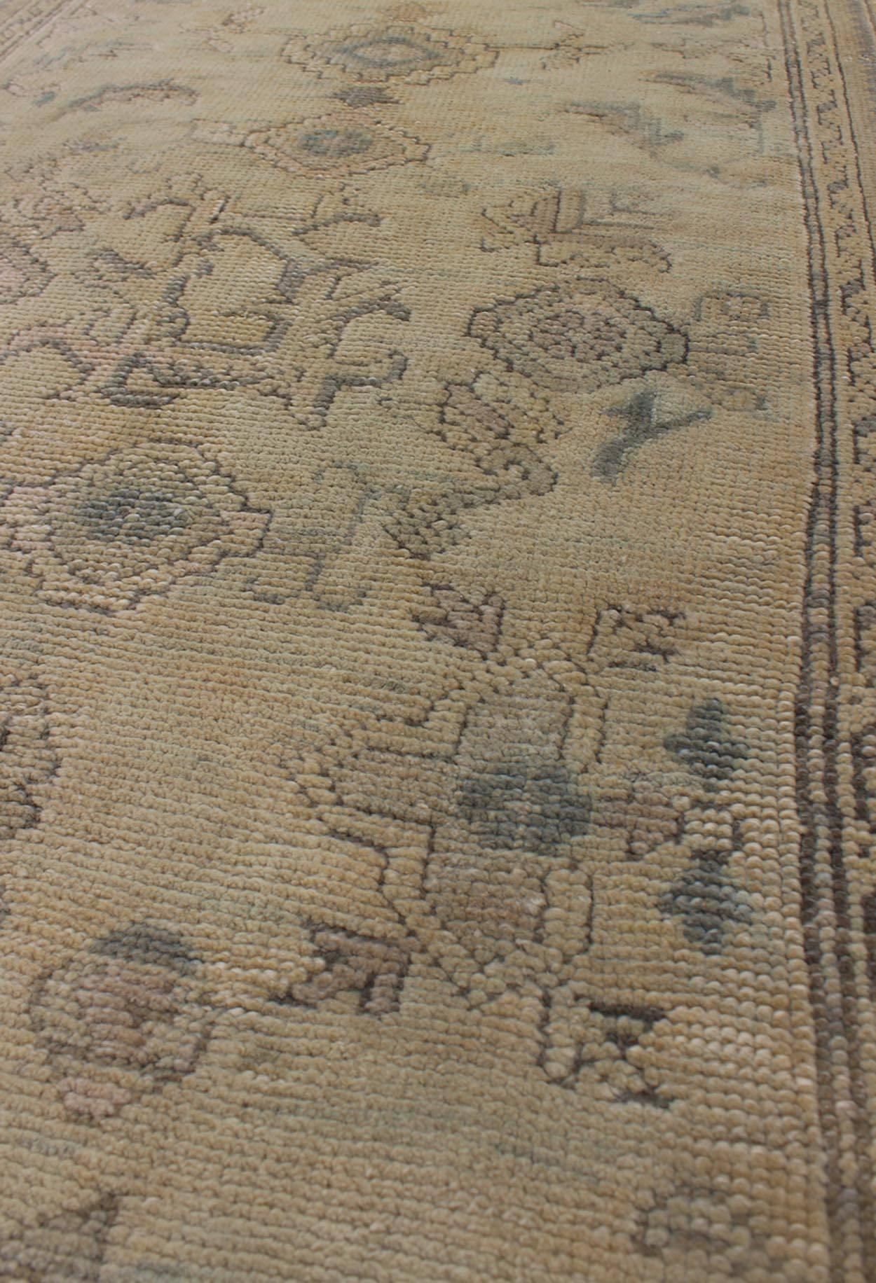 Wool Antique Turkish Oushak Runner with All-Over Design with green and Blue Accents For Sale