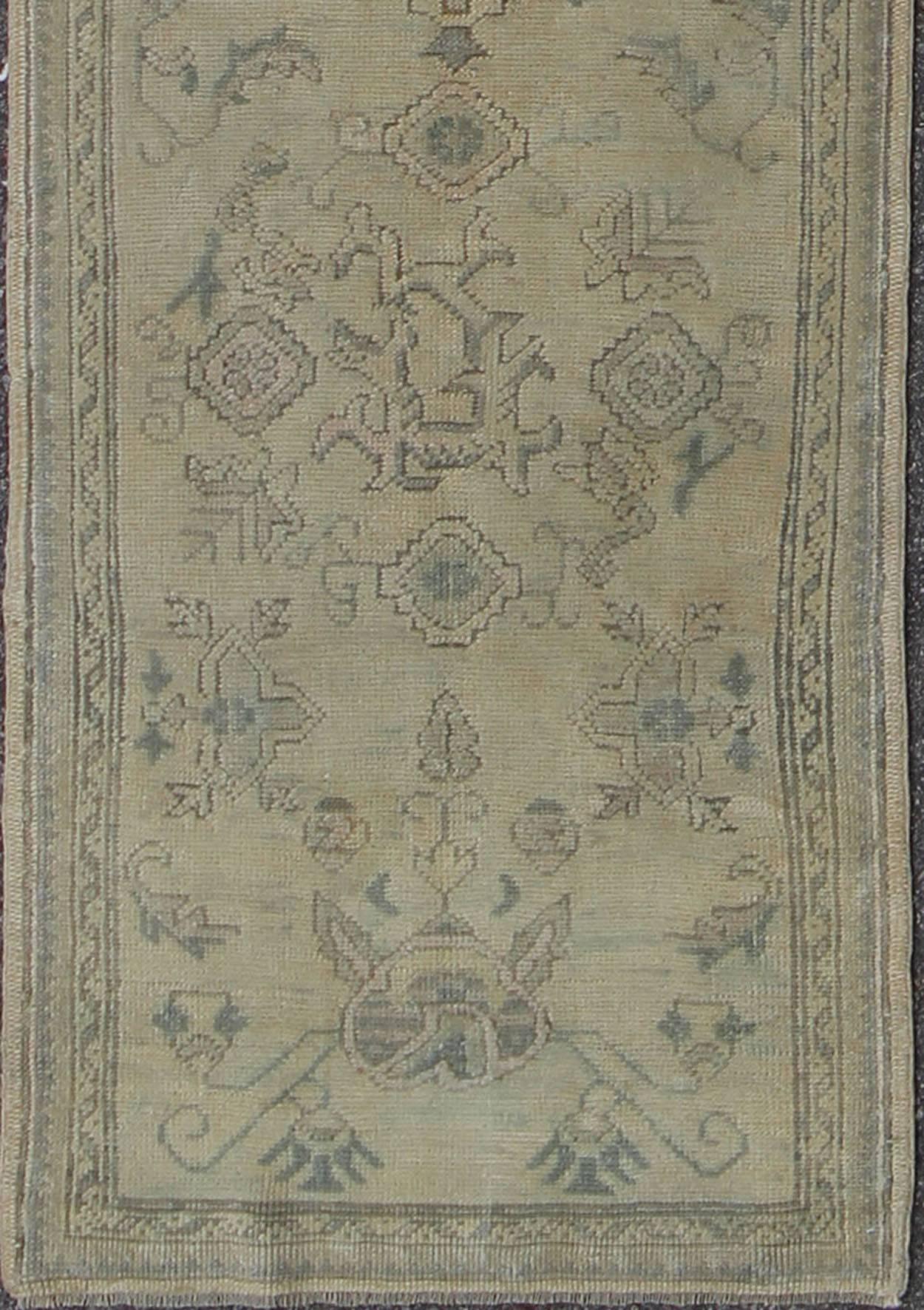 Hand-Knotted Antique Turkish Oushak Runner with All-Over Design with green and Blue Accents For Sale