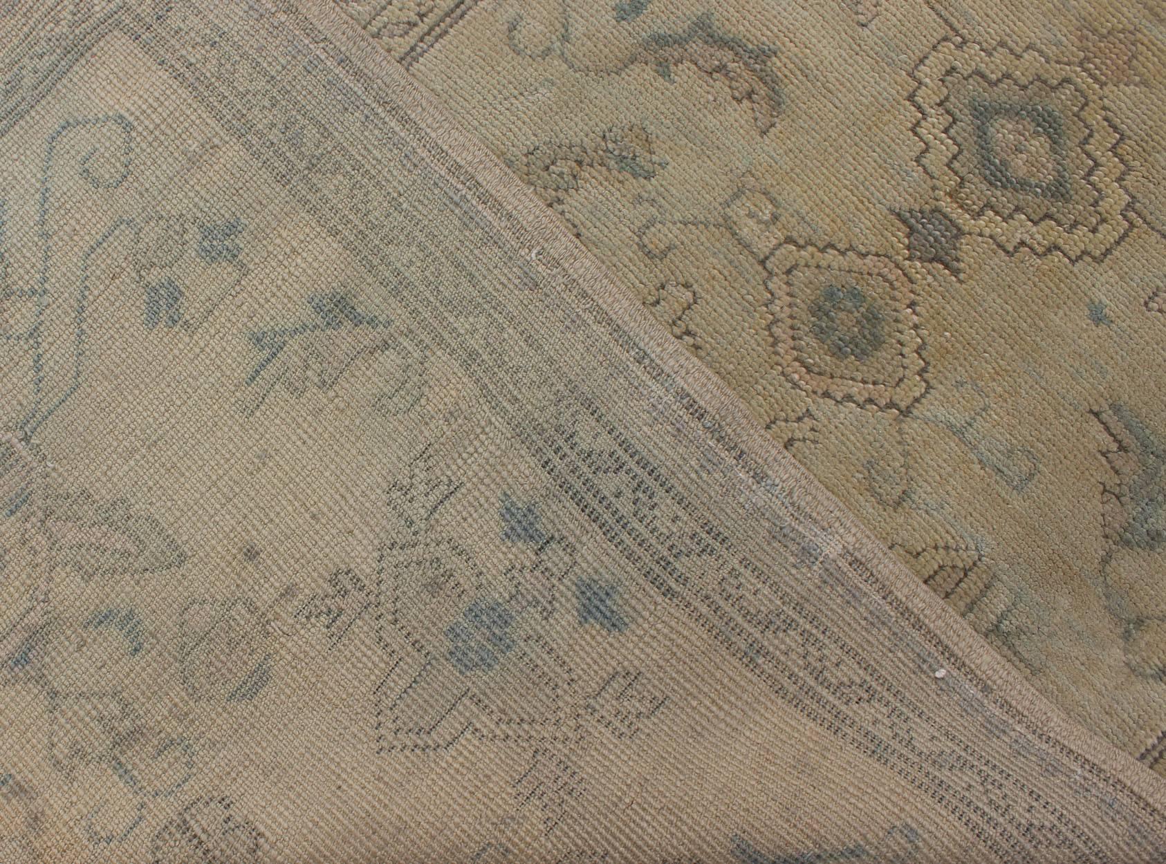Mid-20th Century Antique Turkish Oushak Runner with All-Over Design with green and Blue Accents For Sale
