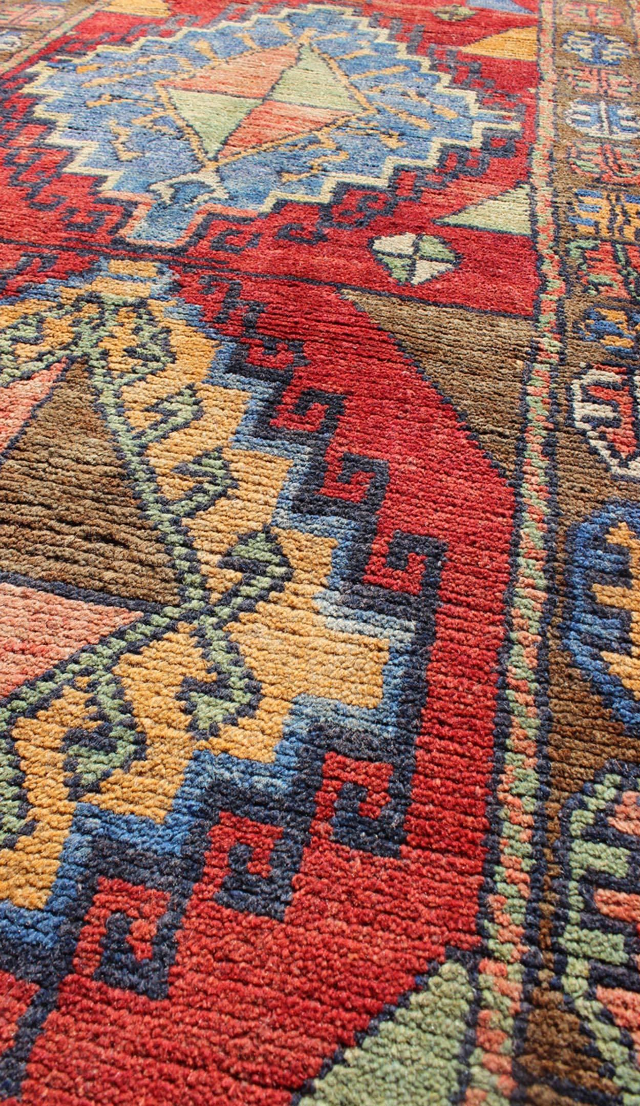 20th Century Hand Knotted Vintage Turkish Oushak Runner with Geometric Tribal Design For Sale