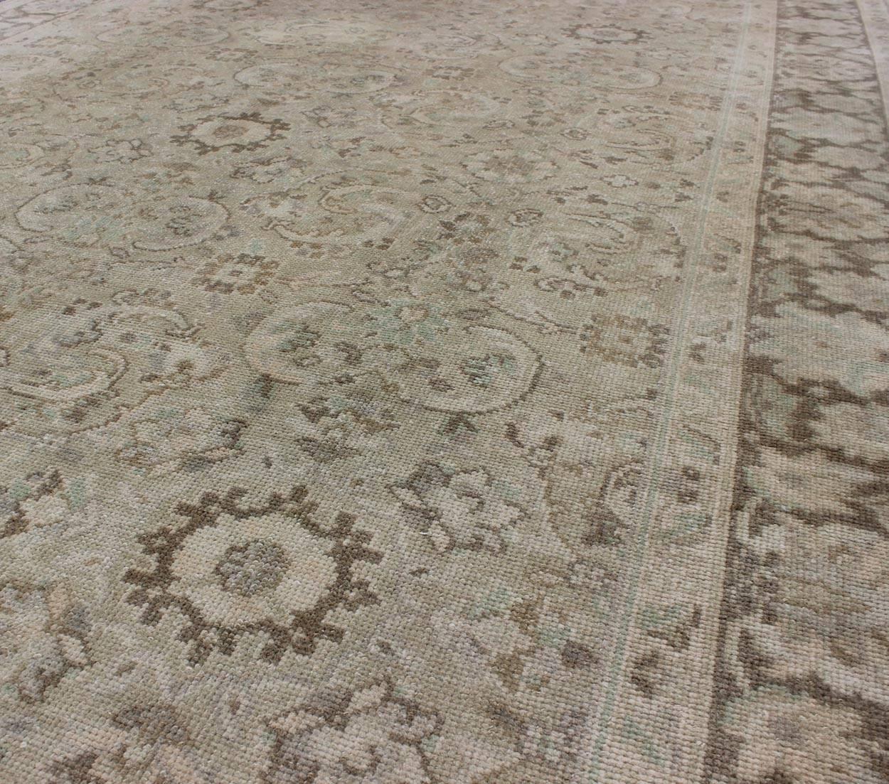 20th Century Vintage Earth Tone Oushak Rug in Sand Color Background With All-Over Design  For Sale