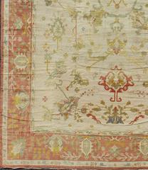 Antique Spanish Large Rug in Ivory Background, Green and Coral Border