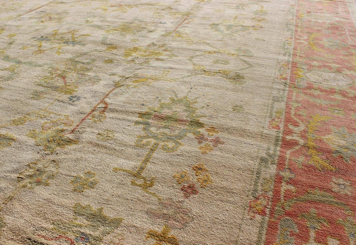 Mid-20th Century Antique Spanish Large Rug in Ivory Background, Green and Coral Border For Sale