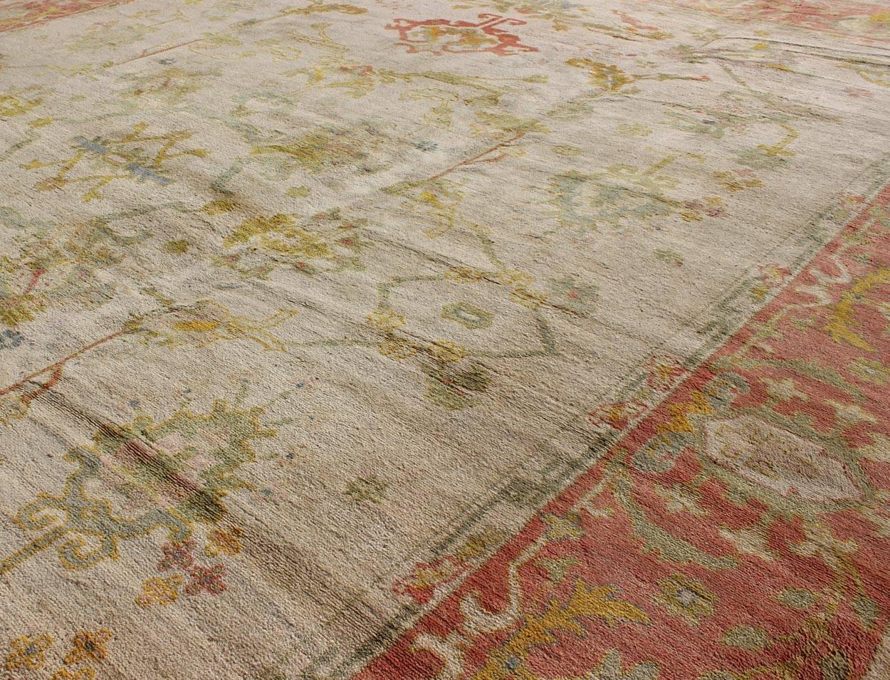 Antique Spanish Large Rug in Ivory Background, Green and Coral Border In Good Condition For Sale In Atlanta, GA