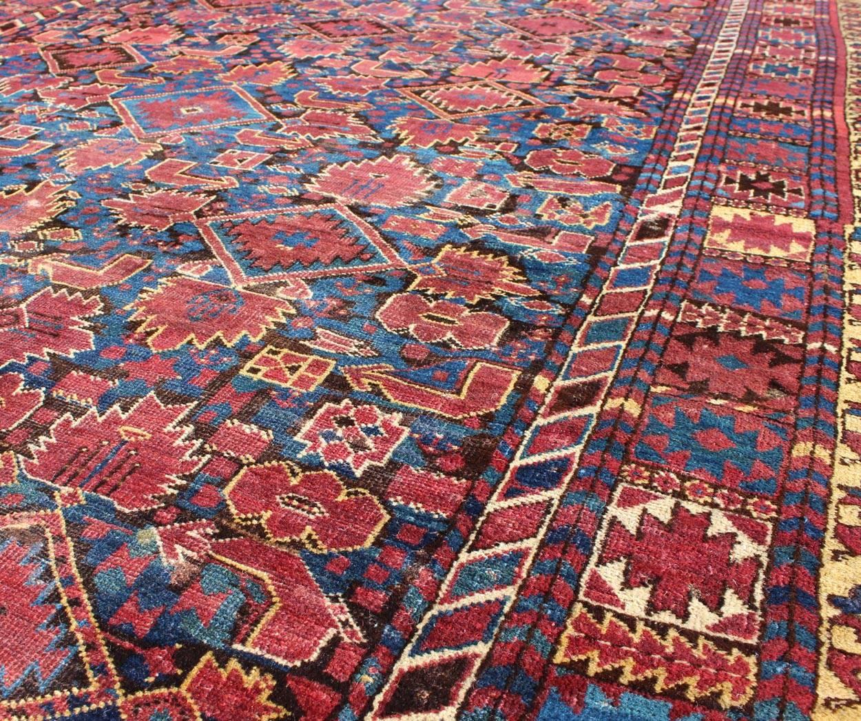 Hand-Knotted Mid 19th Century  Antique Beshir Rug from Turkmenistan in Blue, Red, Brown  For Sale