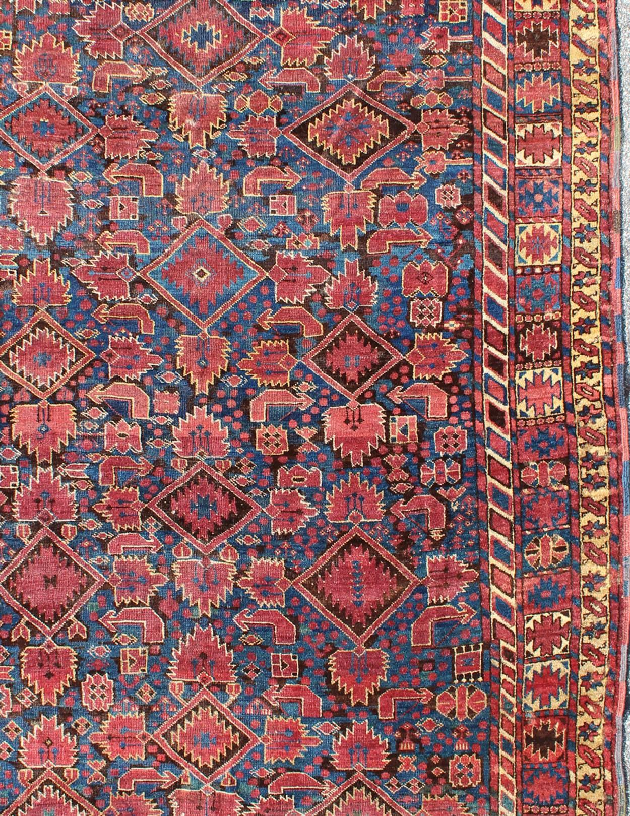 Afghan Mid 19th Century  Antique Beshir Rug from Turkmenistan in Blue, Red, Brown  For Sale