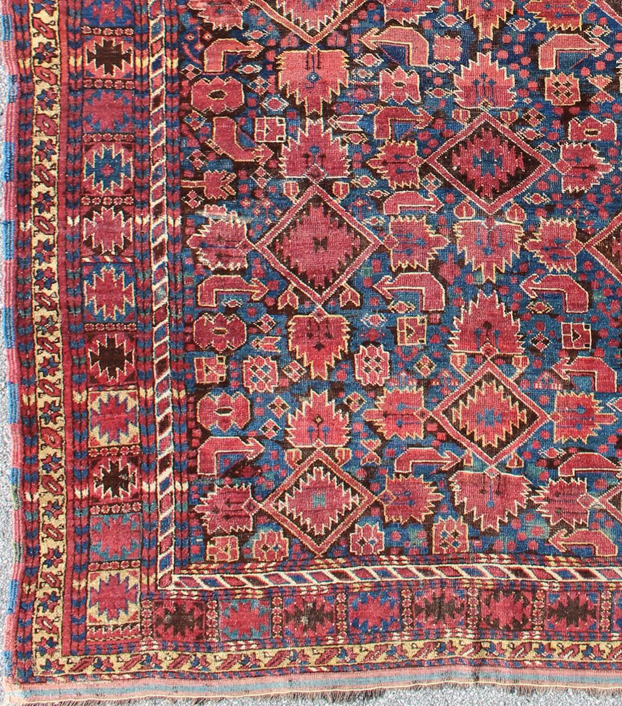  Antique Beshir/Bashir Rug from Mid 19th Century in Blue, Red, Brown, Turkmenistan rug 16-1106. 
Bashir rugs primarily were woven by Ersai Tribes. Ersari Tribe rugs were woven from Uzbekistan to Turkmenistan and into northern Afghanistan. Beshir