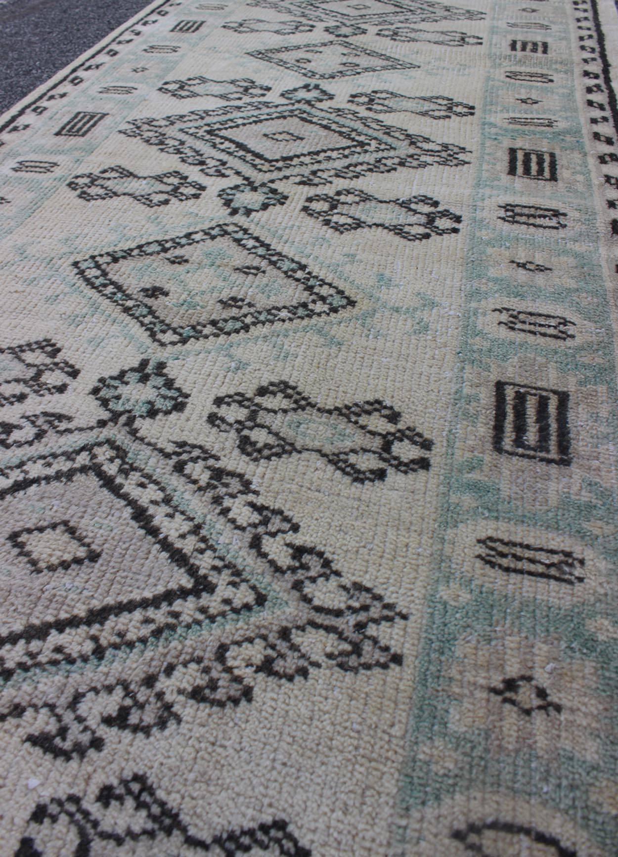 Vintage Oushak Runner with Ornate Medallions and Light Blue Tones In Excellent Condition In Atlanta, GA