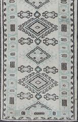 Vintage Oushak Runner with Ornate Medallions and Light Blue Tones