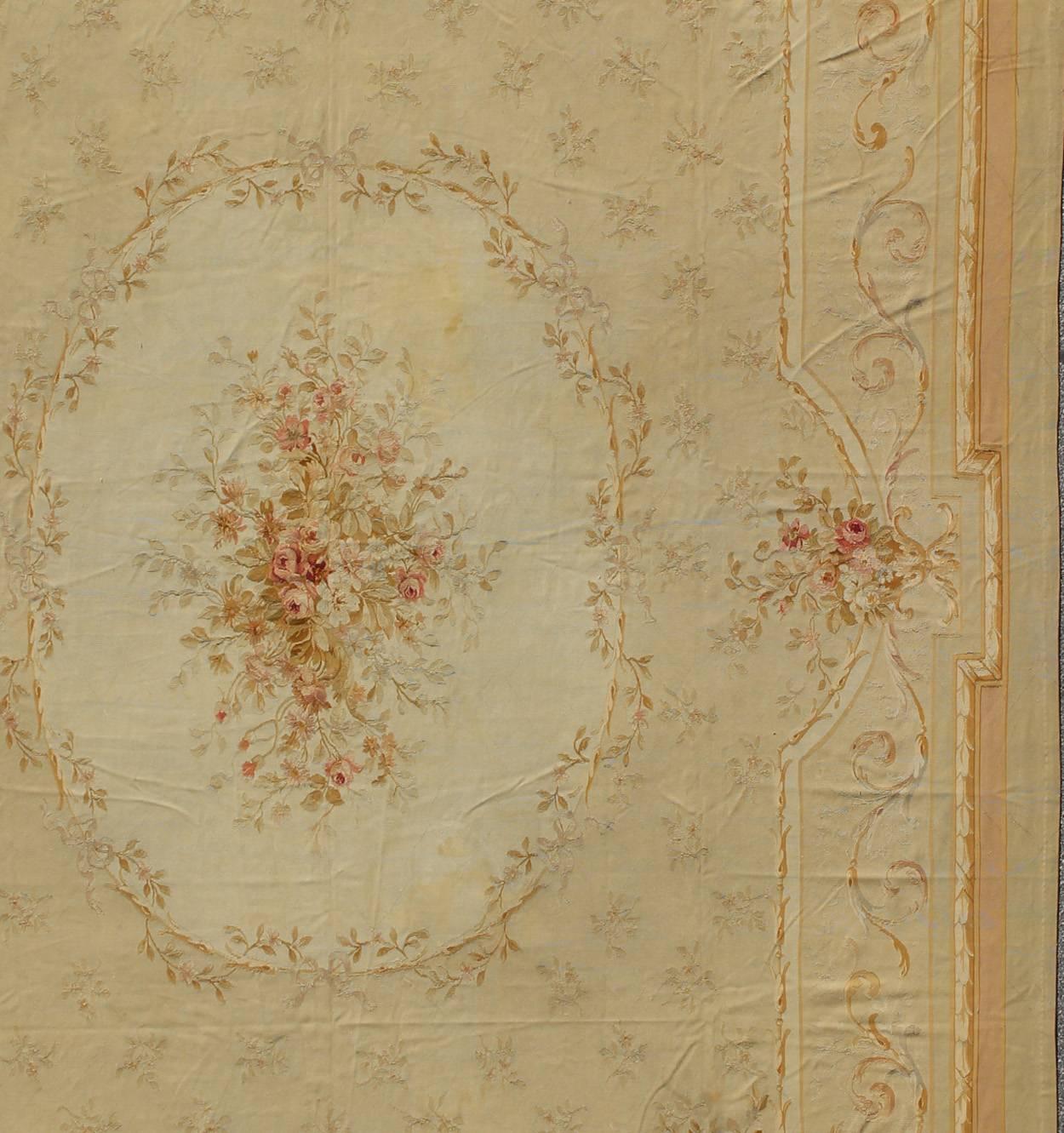 Hand-Knotted Antique French Aubusson Carpet with Romantic Motifs and Delicate Color Palette For Sale