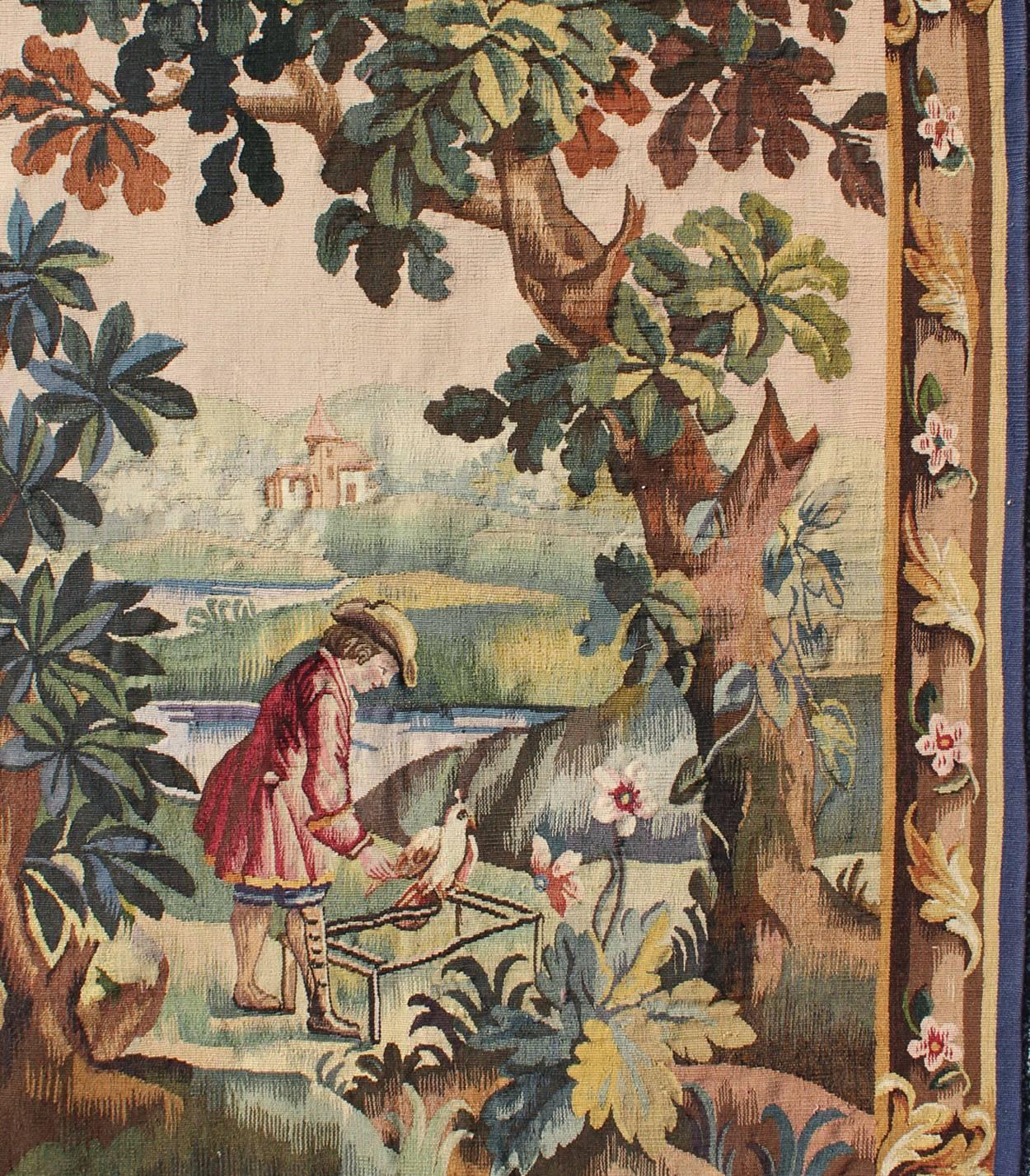 Antique French Aubusson Tapestry with Woodland Scene Surrounded by Floral Border In Excellent Condition For Sale In Atlanta, GA
