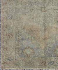 Vintage Turkish Oushak Rug with Muted Colors and Central Medallion Design