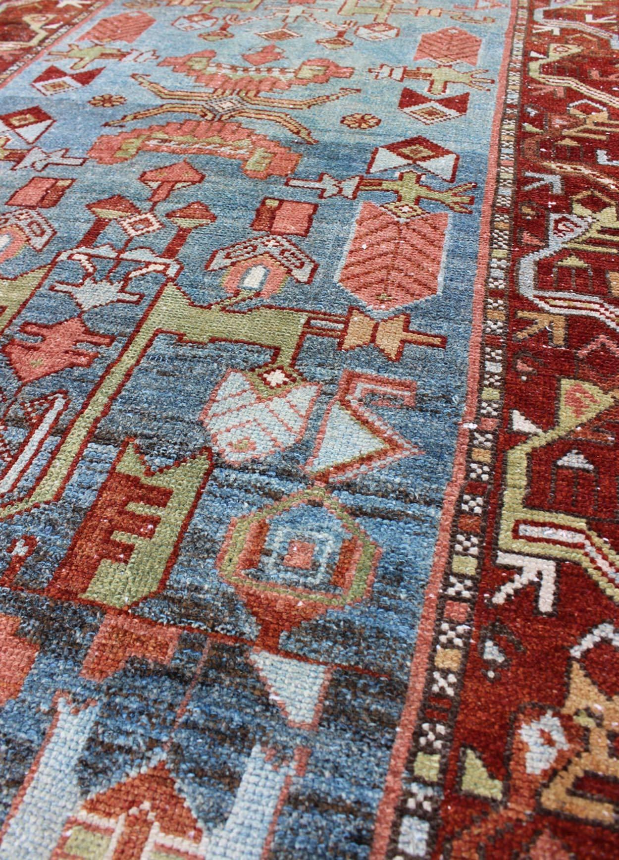Early 20th Century Persian Malayer Runner with Sub-Geometric Tribal Design in Blue, Red and Green For Sale