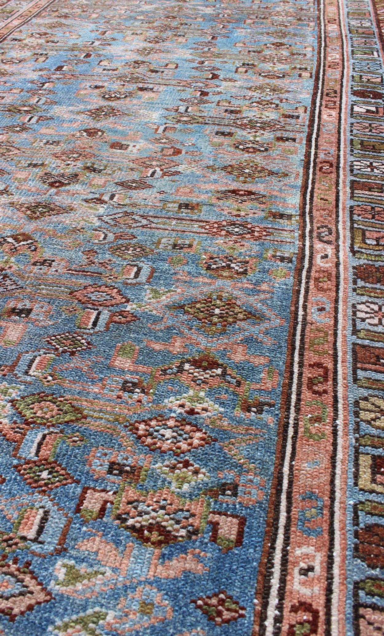 Hand-Knotted Early 20th Century Long Kurdish Runner with Blue, Red, Green and Salmon Pink For Sale