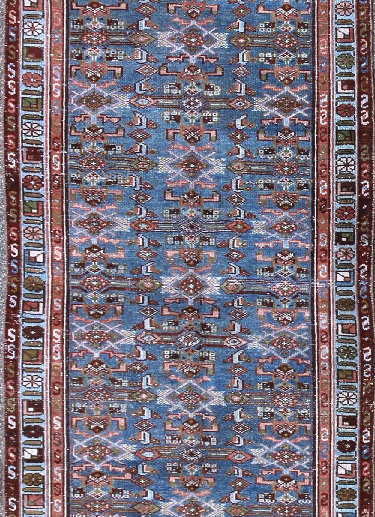 Persian Early 20th Century Long Kurdish Runner with Blue, Red, Green and Salmon Pink For Sale
