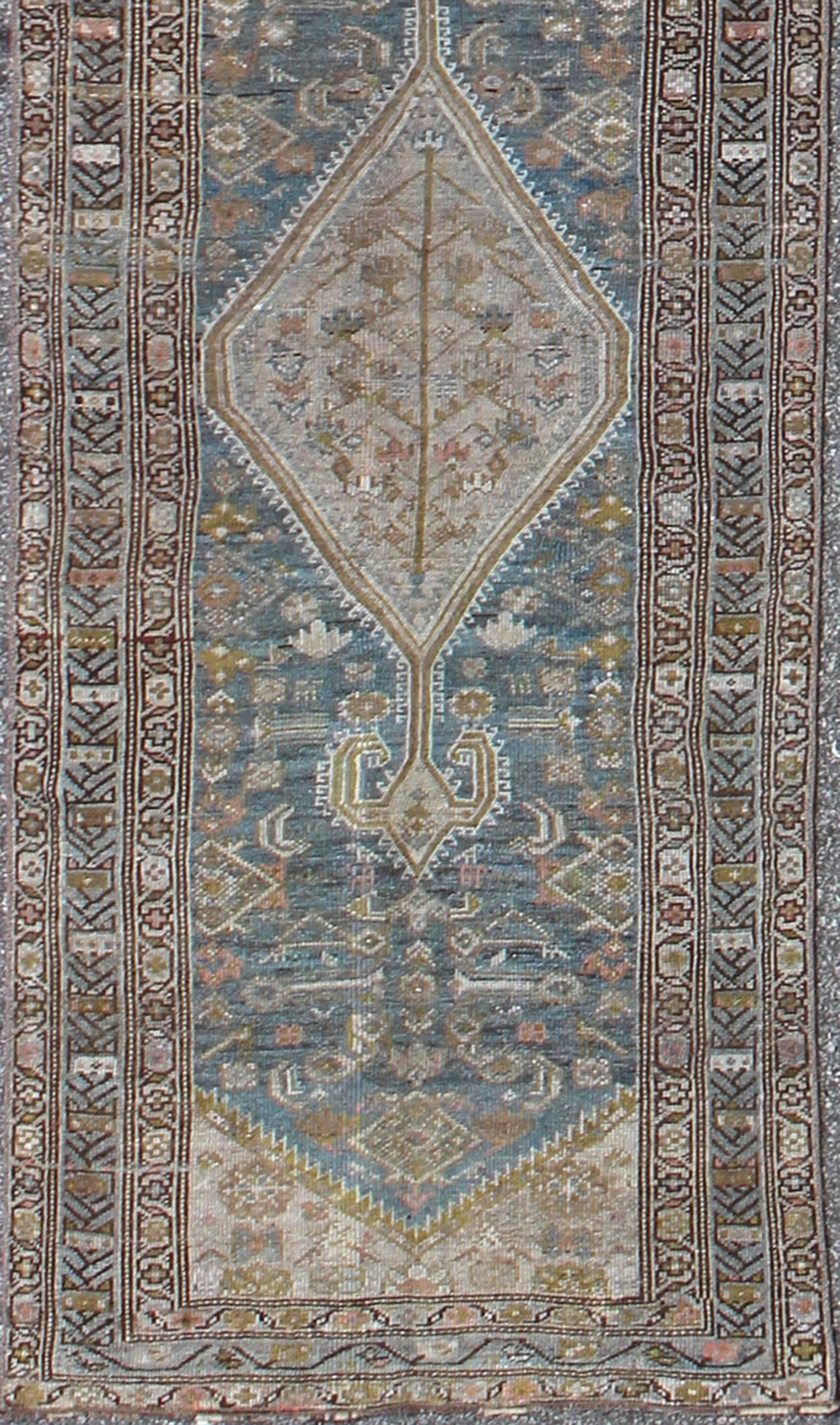 Persian Malayer Runner with Free-Flowing Geometric Pattern and Blue Field

This Persian Malayer runner features a multitude of shades of blue and ivory. The elegant, all-over design in the field consists of a free-flowing geometric pattern, which
