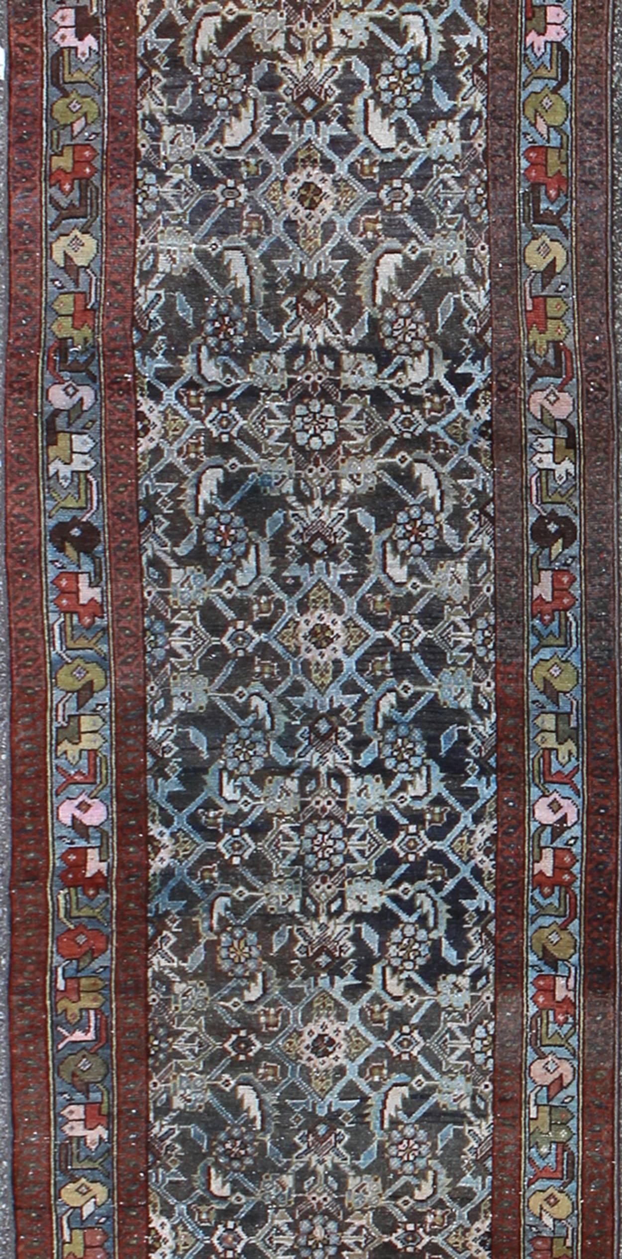 Persian Early 20th Century Very Long Kurdish Runner with Dark/Light Blue, Red and Taupe For Sale