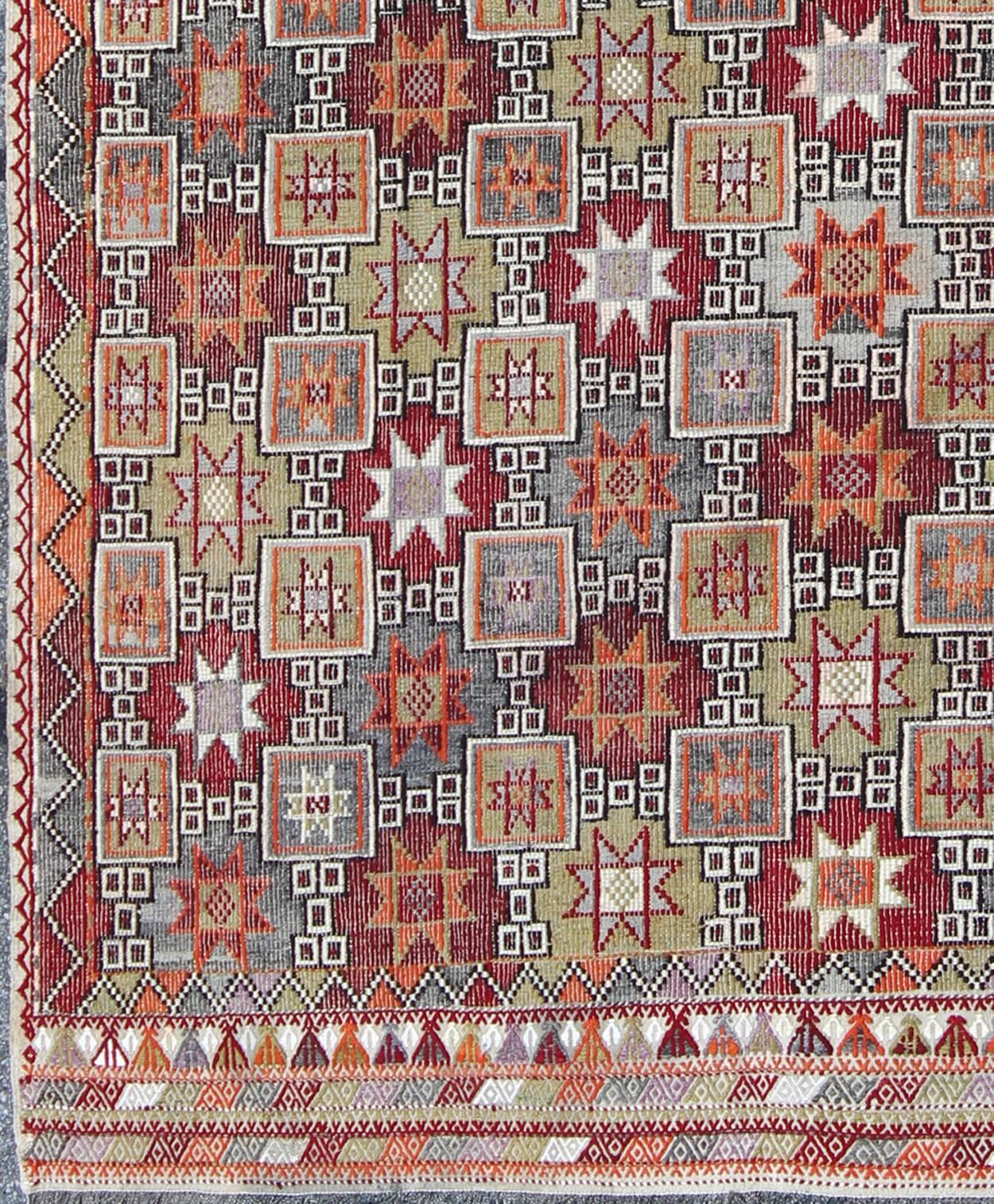 Turkish Vintage Embroidered Kilim Rug With Tribal Star Shapes in Colorful tones, rug / Tu-Ned-012787,  Turkish Vintage Embroidered Kilim, Featuring tribal shapes of stars and boxes with a spotted and speckled assortment of geometric elements, this