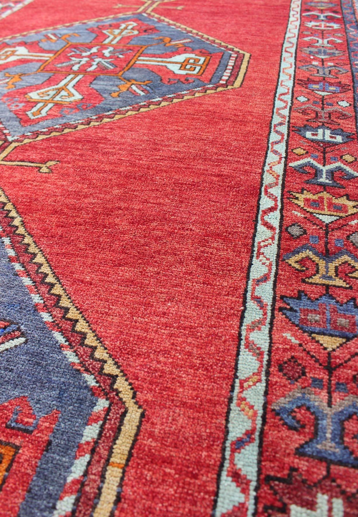 20th Century Colorful Turkish Oushak Runner in Various Shades of Red, Blue, and Yellow For Sale
