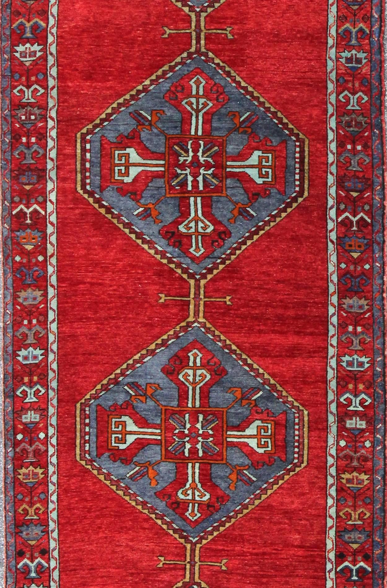 Hand-Knotted Colorful Turkish Oushak Runner in Various Shades of Red, Blue, and Yellow For Sale