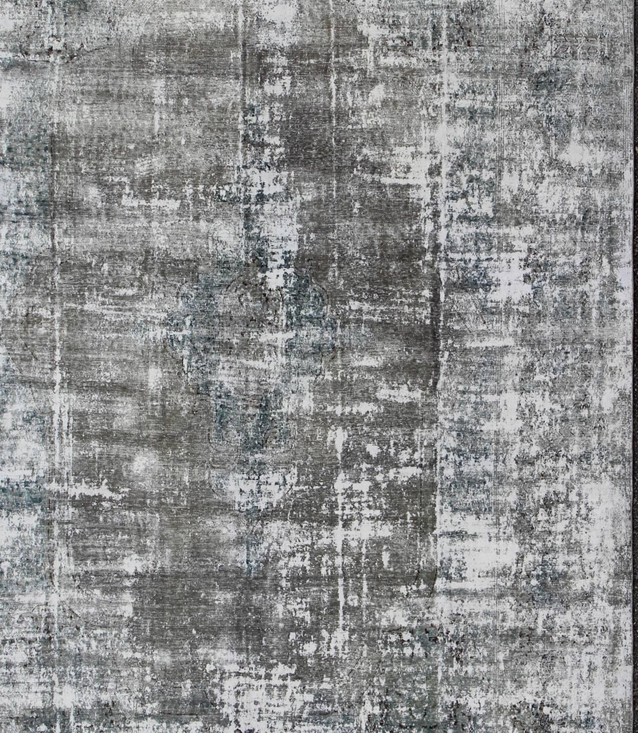 Distressed Vintage Persian Rug with Abstract Modern Design in Shades of Warm Gray, Silver, and Blue colors.
Measures: 9'9 x 14'7
Distressed vintage Persian large abstract Rug with Modern Design/ abstract design in Silver, Warm Gray, and Blue & White