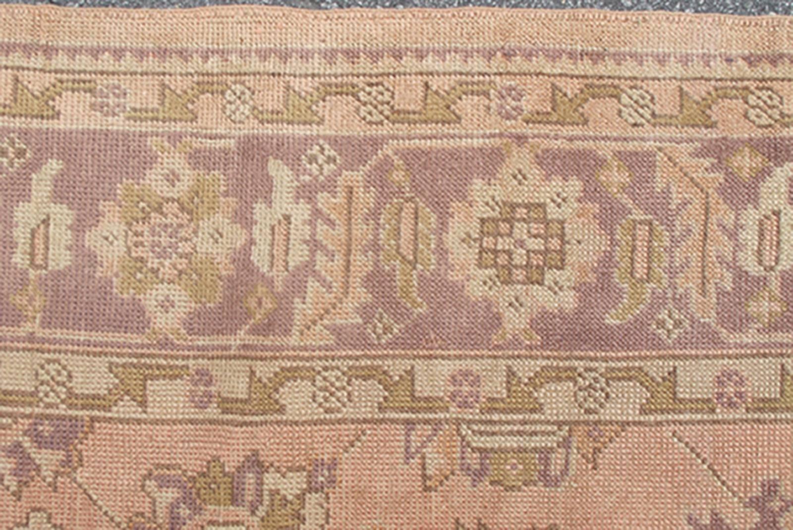 Antique Turkish Oushak Rug with Floral Motifs in Lavender, Coral-Pink, and Green In Good Condition For Sale In Atlanta, GA