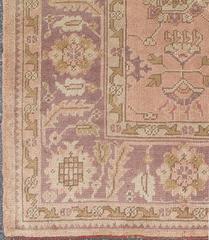 Antique Turkish Oushak Rug with Floral Motifs in Lavender, Coral-Pink, and Green