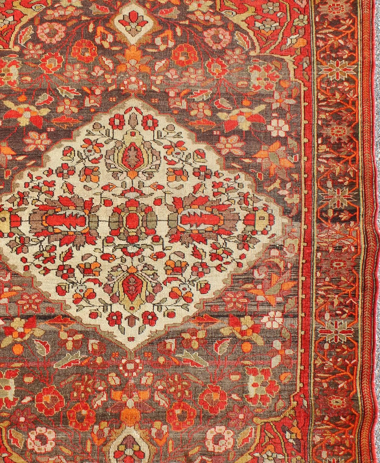Hand-Knotted Sarouk Farahan Rug with Florals and Vine Scrolls in Red, Ivory, Taupe and Orange For Sale