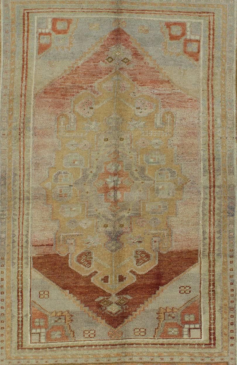 Hand-Knotted Vintage Turkish Oushak with Large Central Medallion in Cream, Yellow, Brown and  For Sale