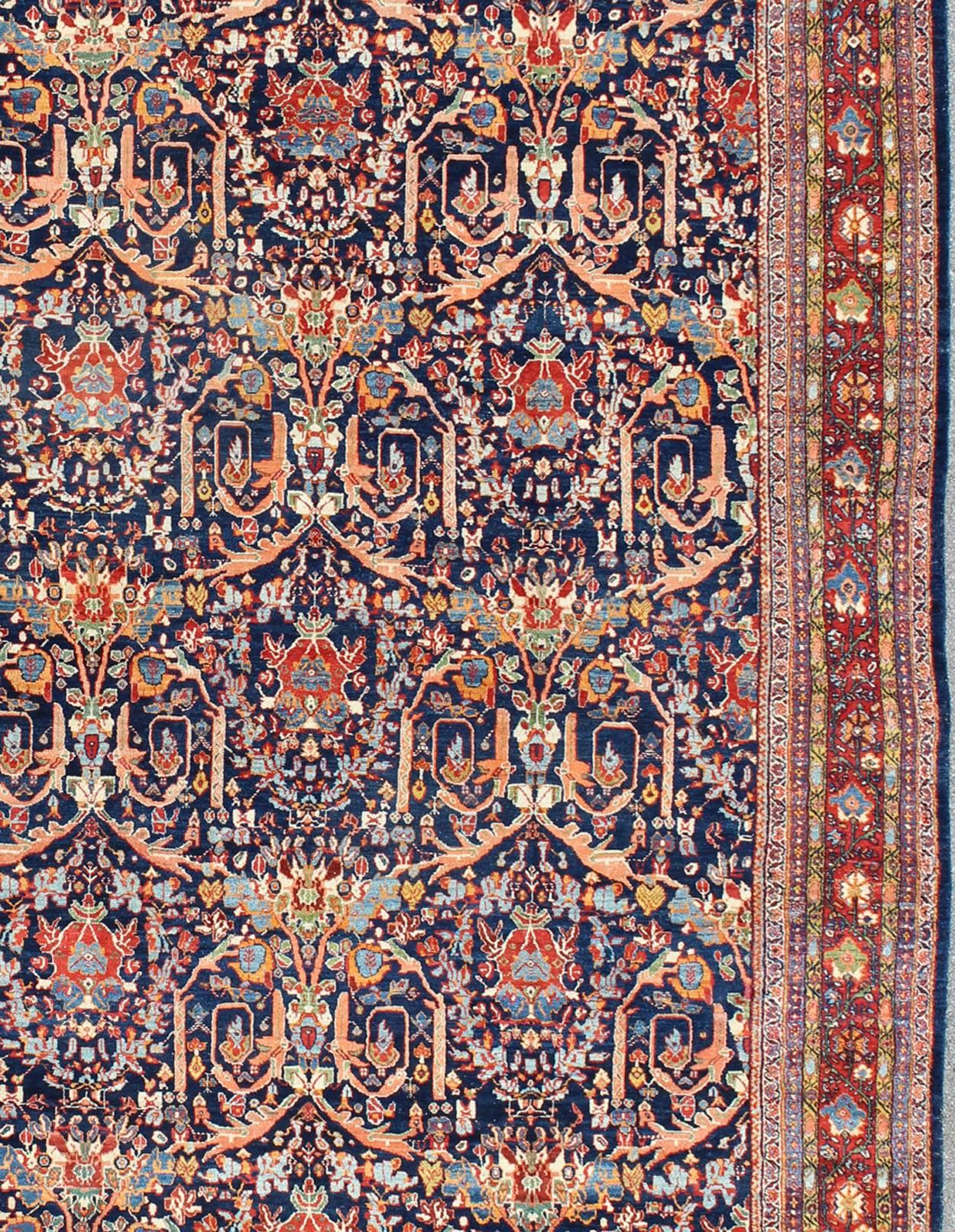 Large Antique Persian Sultanabad Rug in Blue Background & Multi Colors In Good Condition For Sale In Atlanta, GA