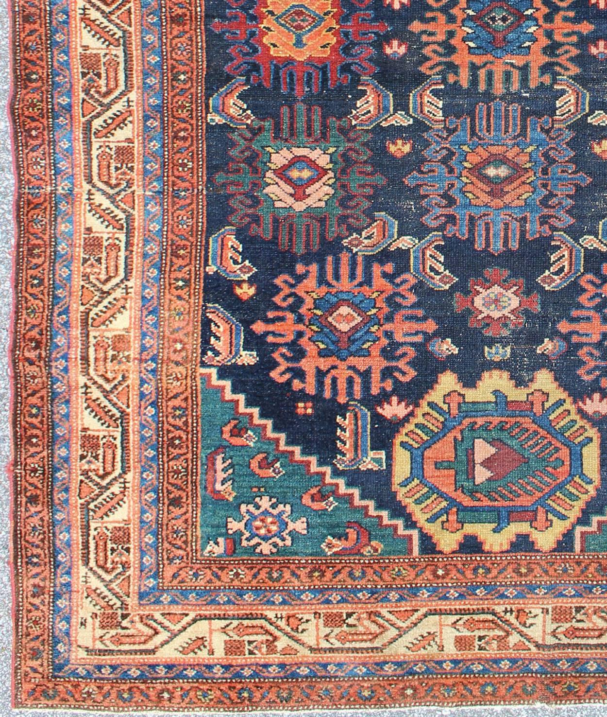 Antique Persian Malayer Carpet with Colorful, All-Over Sub-Geometric Design, rug 17-0601, country of origin / type: Iran / Malayer, circa 1910. This magnificent antique Persian Malayer carpet bears a beautiful, all-over sub-geometric design paired