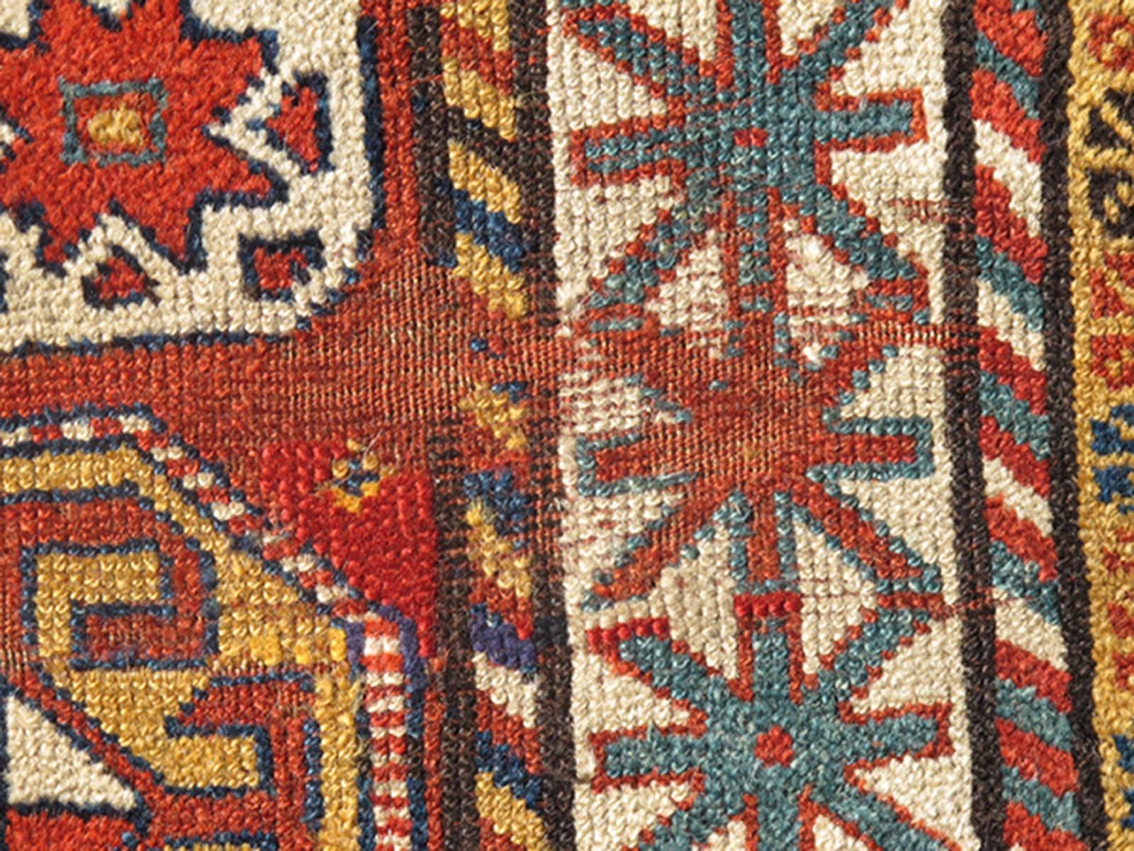 Unique Antique Qashqai Rug with Geometric Motifs in Red, Blue, and Golden Yellow In Good Condition For Sale In Atlanta, GA