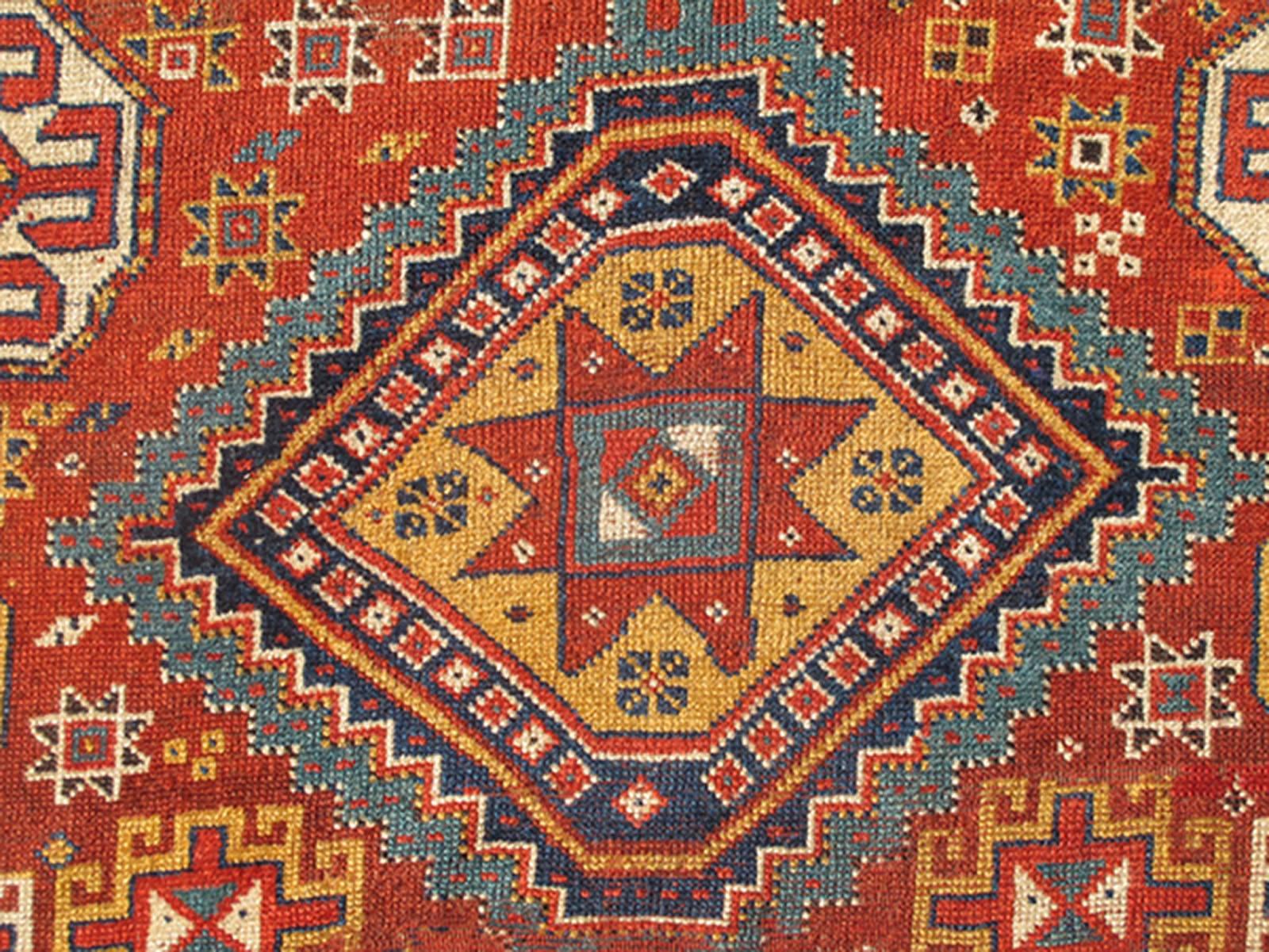 Wool Unique Antique Qashqai Rug with Geometric Motifs in Red, Blue, and Golden Yellow For Sale