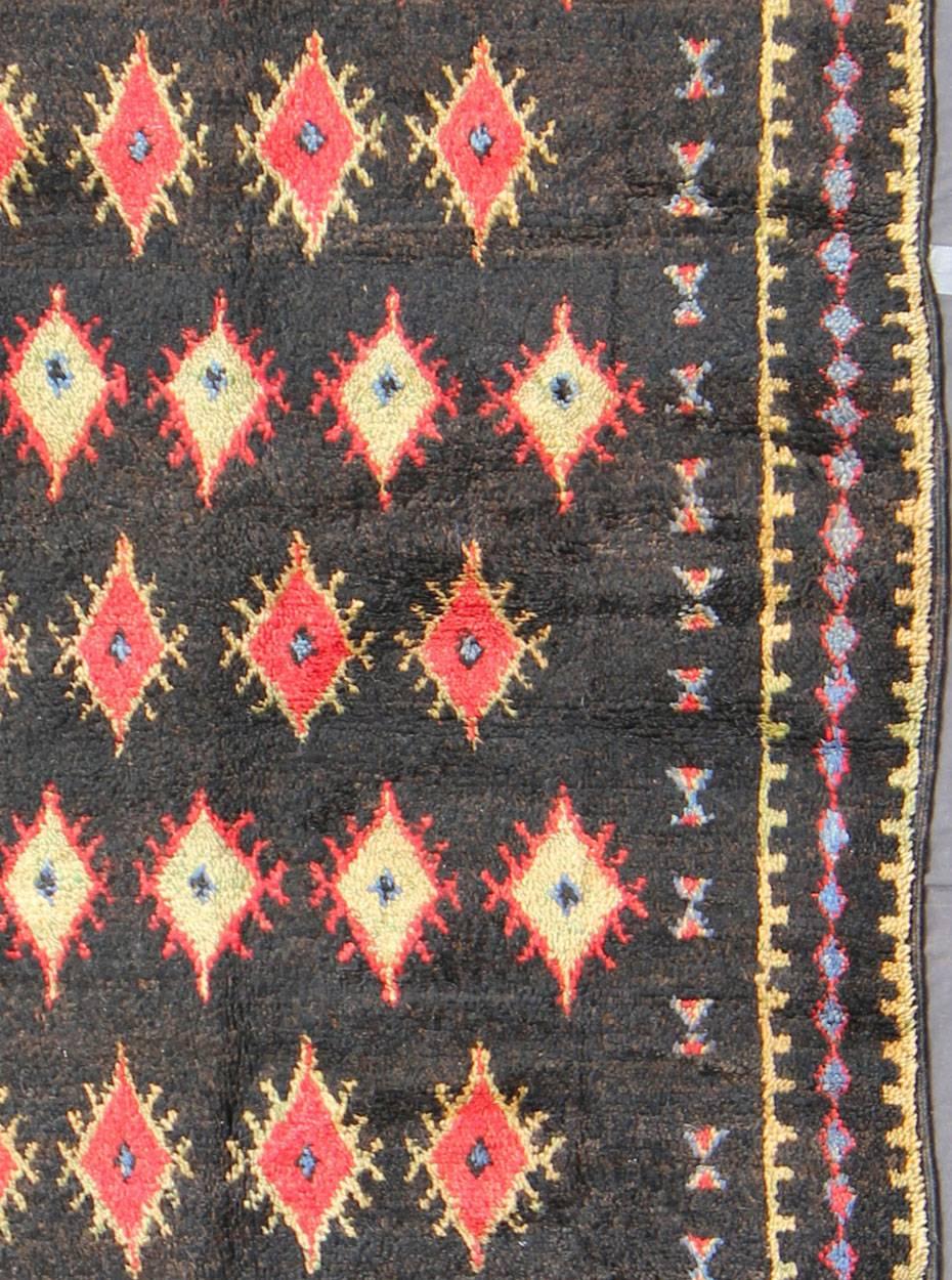 Tribal Charcoal Black Background Unique Vintage Moroccan Rug in Red and Yellow For Sale