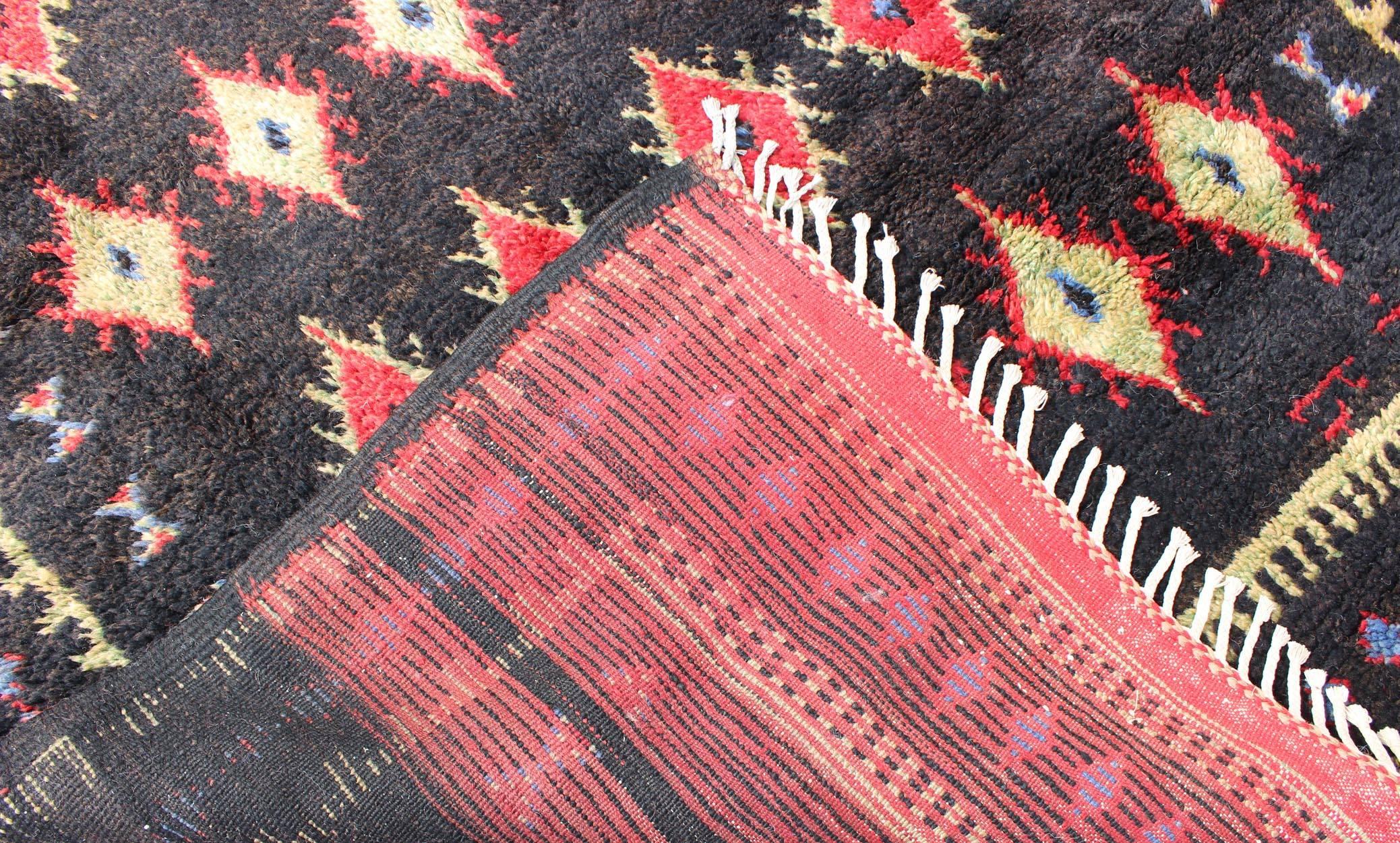 Hand-Knotted Charcoal Black Background Unique Vintage Moroccan Rug in Red and Yellow For Sale