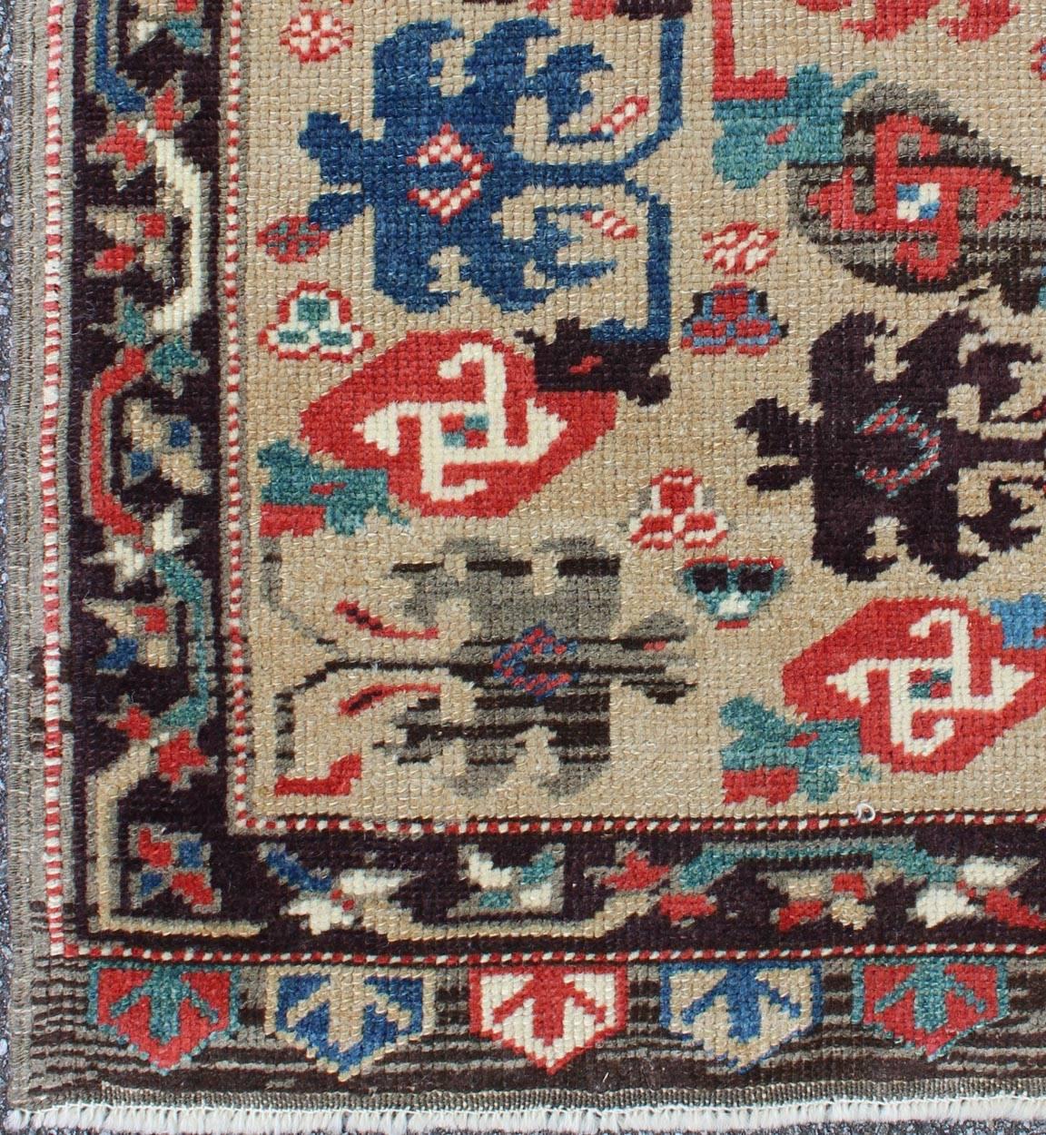Colorful and cream background Vintage Turkish Oushak rug with all-over Tribal design, rug msd-2, country of origin / type: Turkey / Oushak, circa mid-20th century

Produced in mid-20th century Turkey, this vintage Oushak is characterized by a