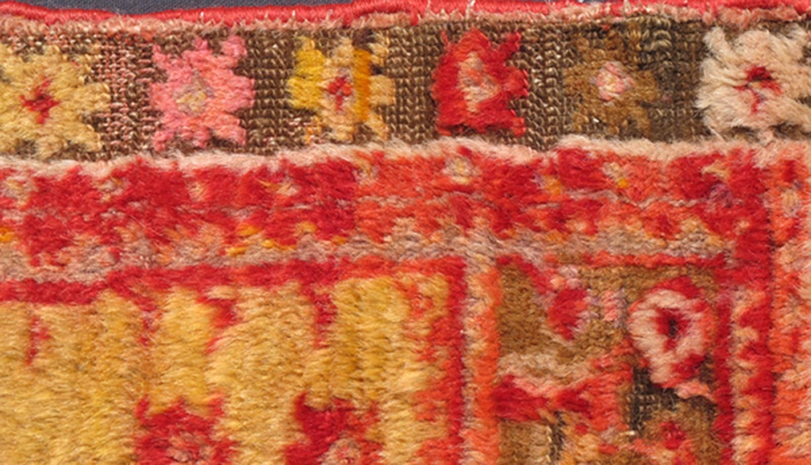Angora wool antique Turkish Oushak rug with vibrant red, green and gold, Floral Medallion Design, rug S12-0512, country of origin / type: Turkey / Oushak, circa 1910.

Woven with Angora wool, this magnificent Oushak boasts a central medallion