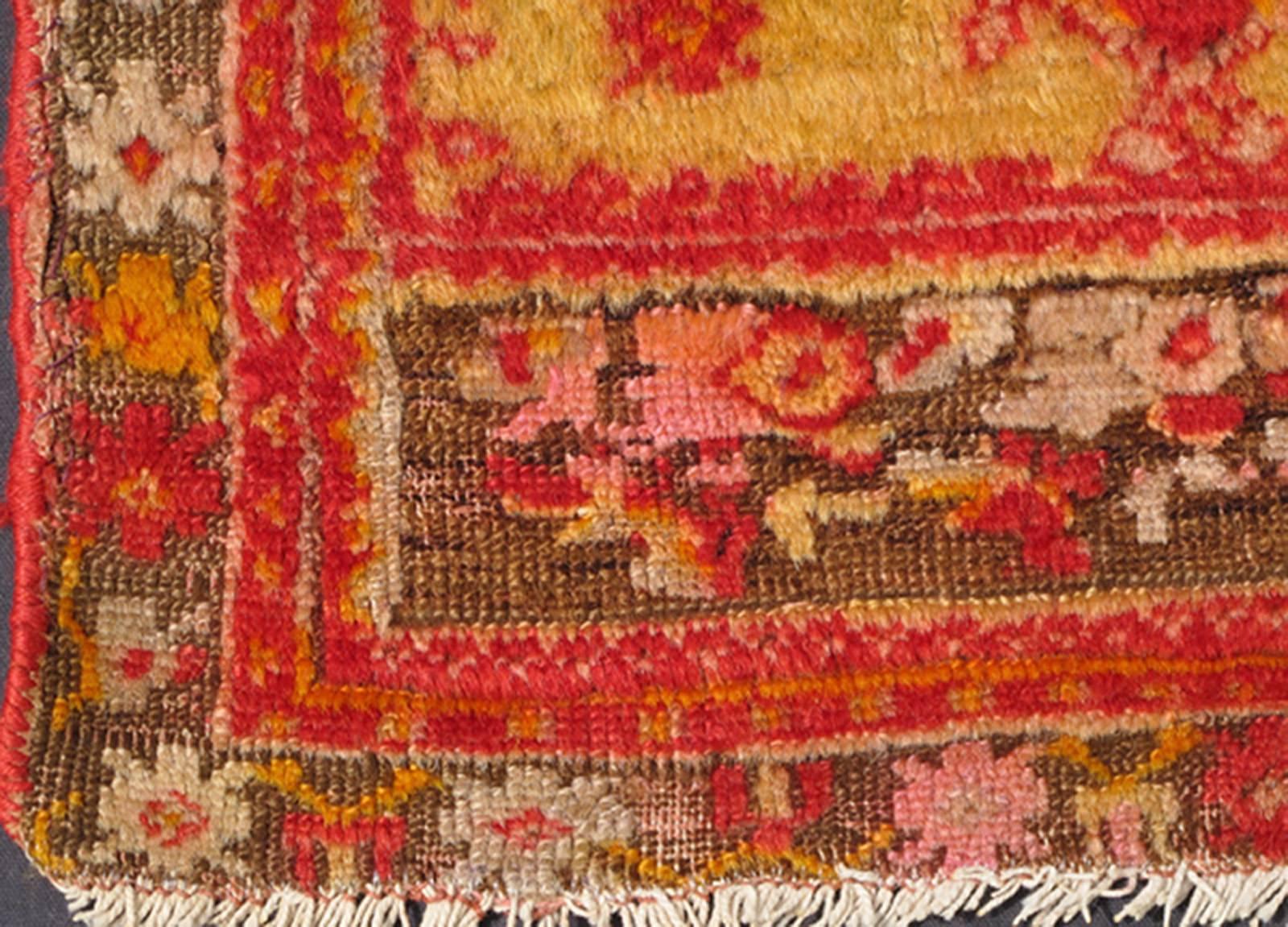 Hand-Knotted Small Antique Angora Small Turkish Oushak Rug with Vibrant Red, Green and Gold For Sale