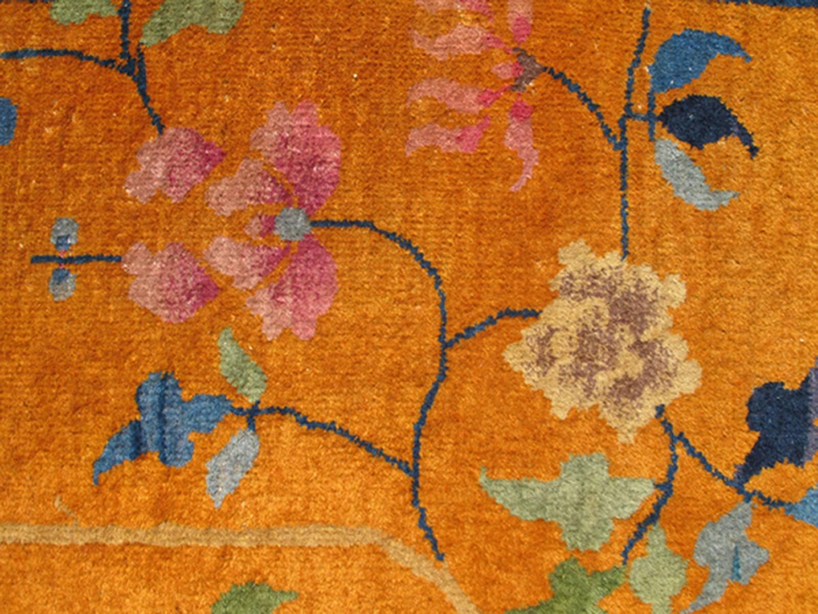 orange flower rug