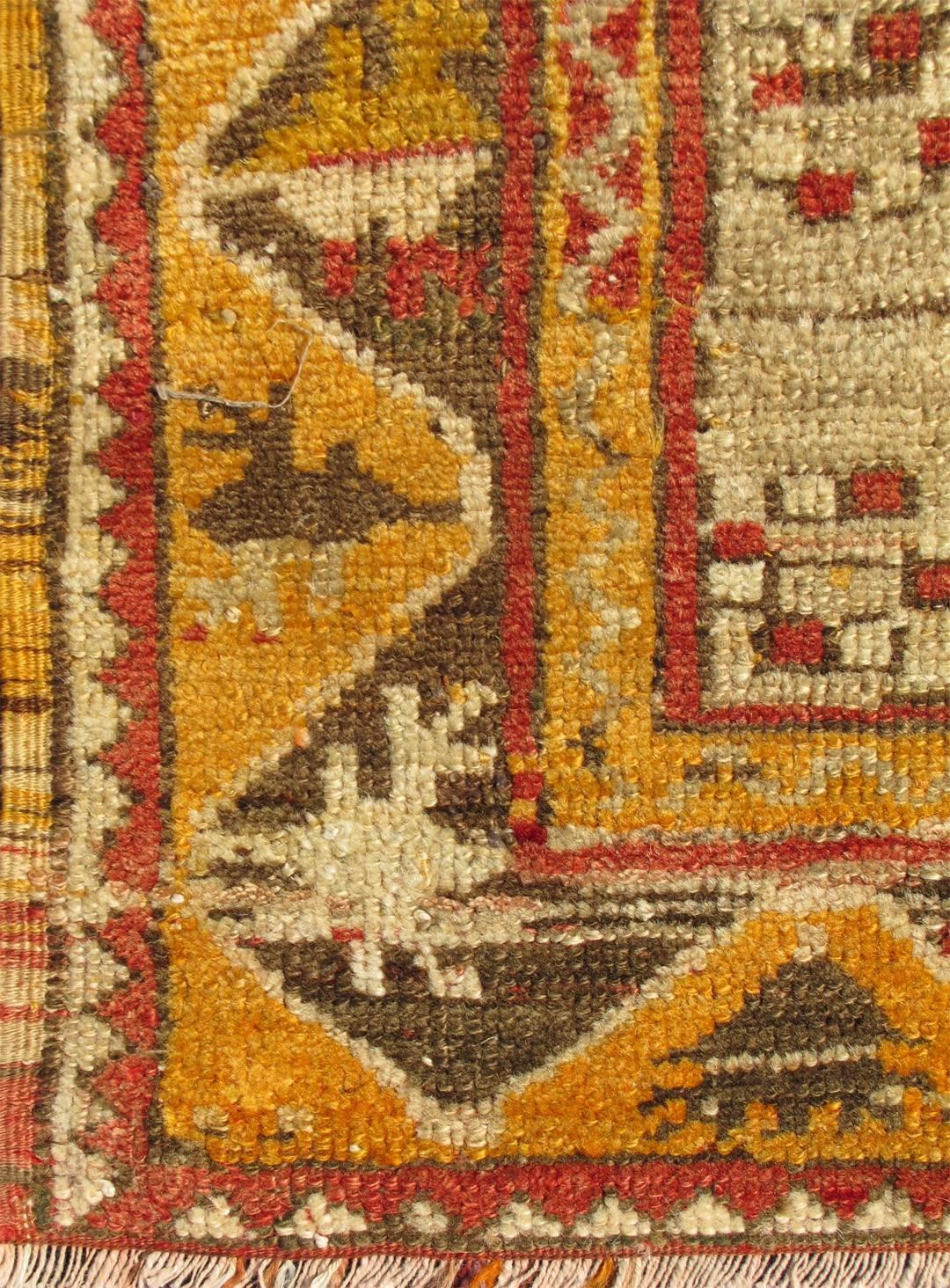 Antique Turkish Oushak prayer rug in red, ivory, brown, orange and yellow, 1910, rug ca-12793, country of origin / type: Turkey / Oushak, circa 1910

This antique Turkish rug, circa 1910 features an intricately beautiful design. The prayer centre