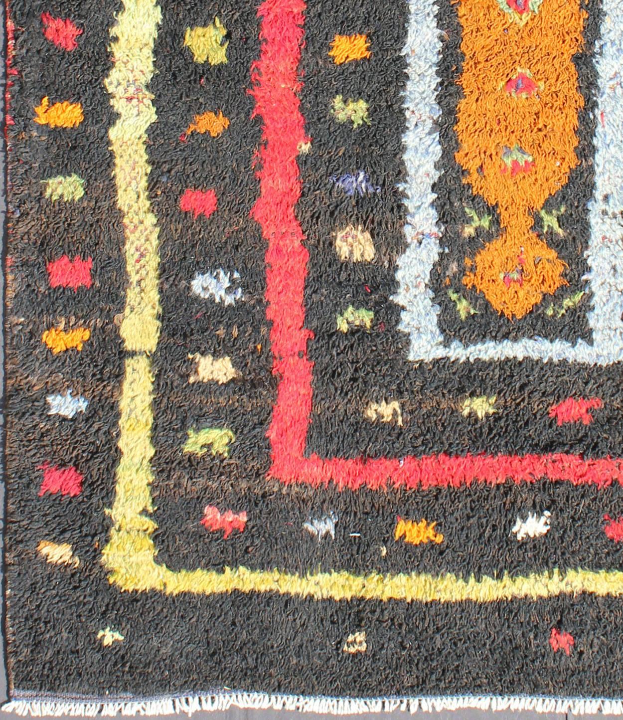 Hand-Knotted Vintage Turkish Tulu Rug with Tribal Pattern in Black, Yellow, Red, Blue and Red For Sale