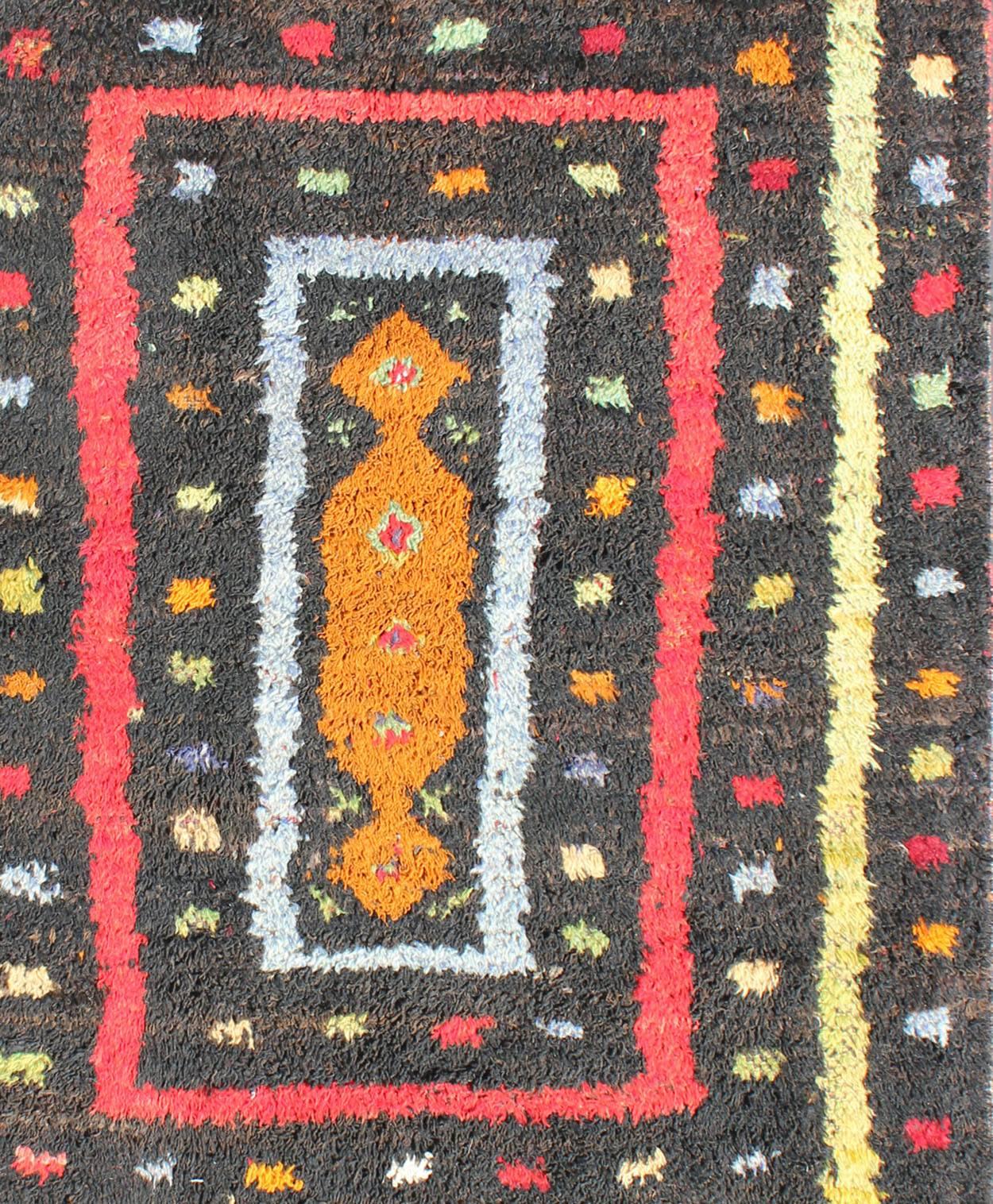 20th Century Vintage Turkish Tulu Rug with Tribal Pattern in Black, Yellow, Red, Blue and Red For Sale