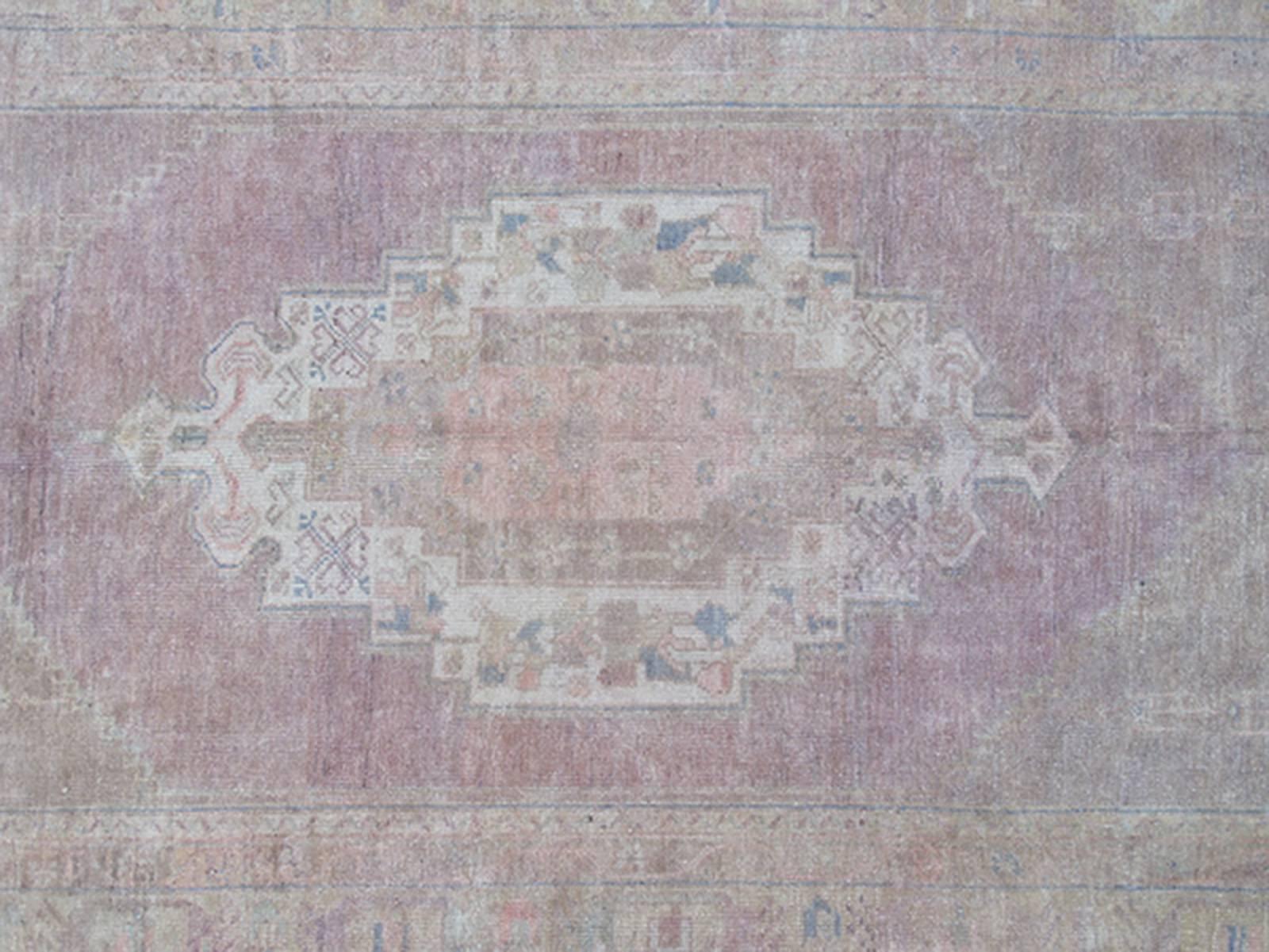 muted pink rug