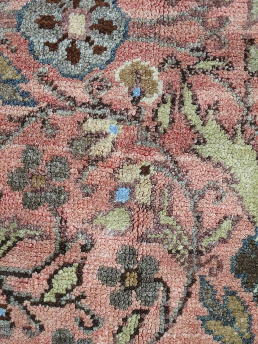 Vintage Turkish Oushak rug with all-over floral design rug# hac-01, country of origin / type: Turkey / Oushak, circa mid-20th century

The design of this beautiful vintage Oushak rug from mid-20th century Turkey. The pink-coral ground is home to